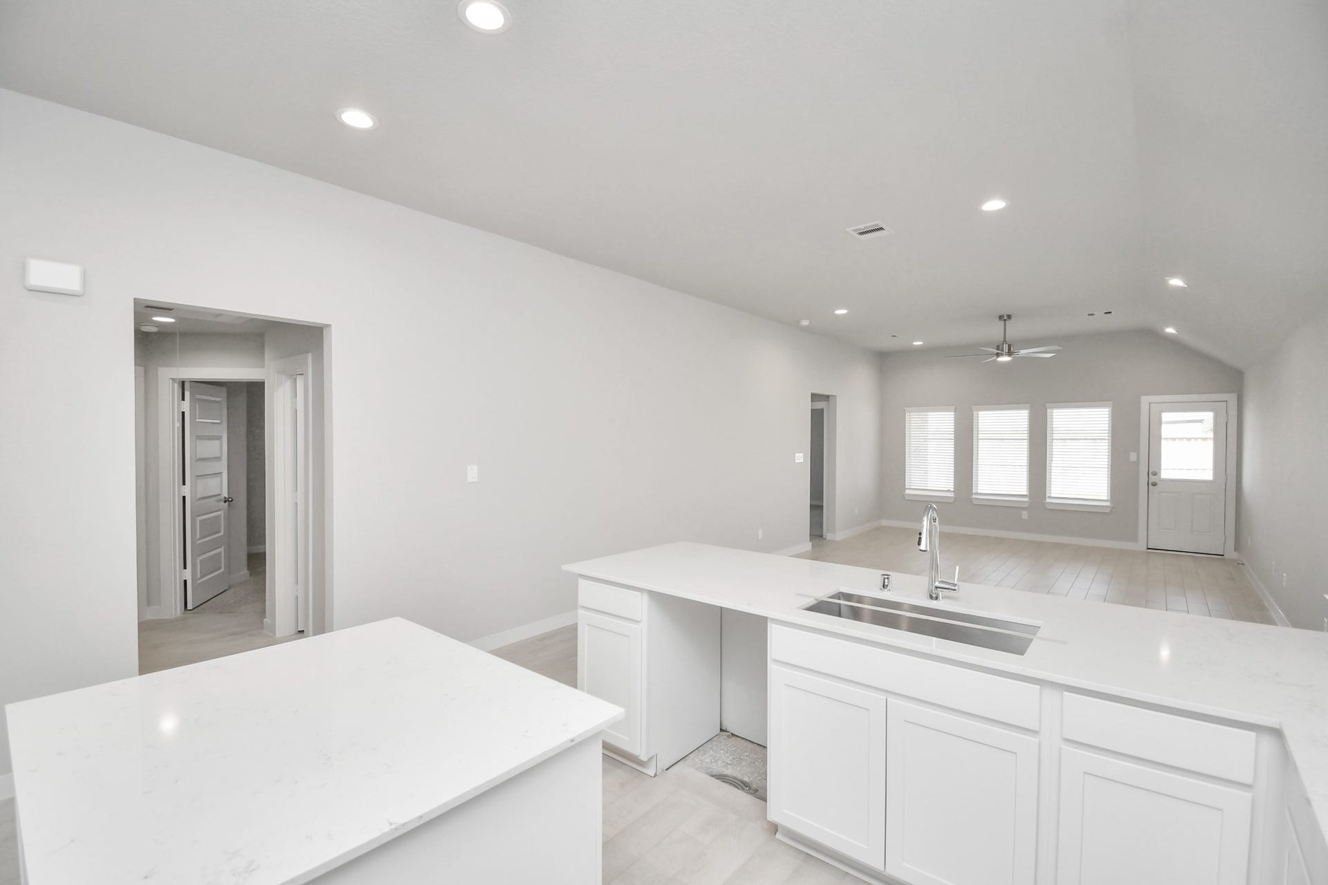 16007 Sycamore Maple Lane, Cypress, TX 77429 Discover another perspective of this stunning kitchen, generously appointed with an abundance of counter space. Sample photo of completed home with similar floor plan. Actual colors and selections may vary.