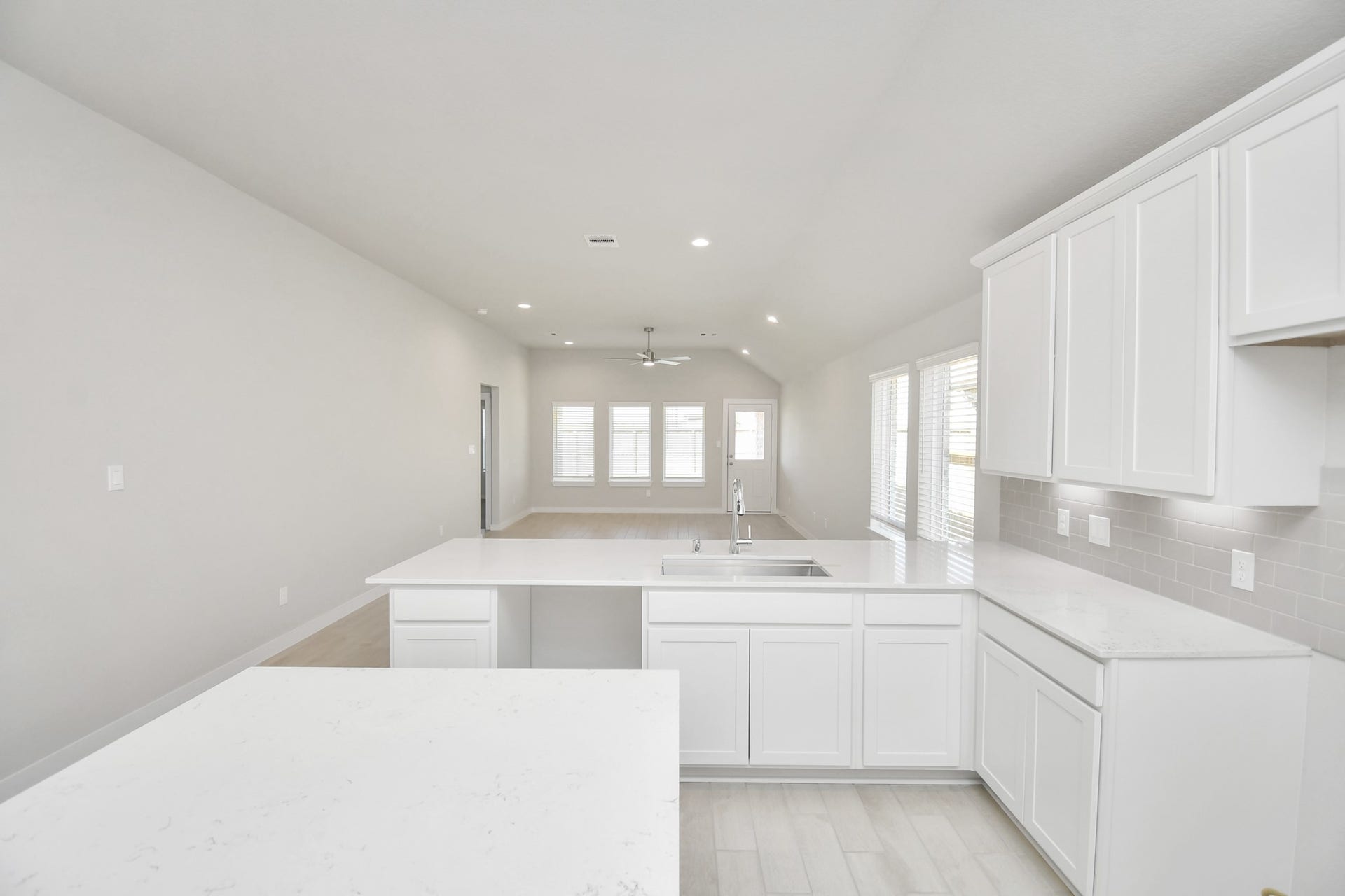 16007 Sycamore Maple Lane, Cypress, TX 77429 This generously spacious kitchen is a dream realized! Sample photo of completed home with similar floor plan. Actual colors and selections may vary.