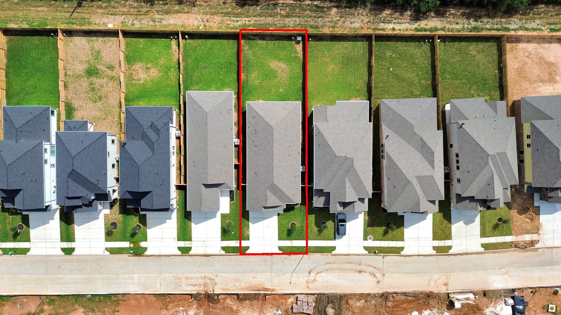 16007 Sycamore Maple Lane, Cypress, TX 77429 An aerial view of a spacious subdivision lot, highlighting a well-maintained yard and a fully fenced perimeter, offering both privacy and expansive outdoor space.