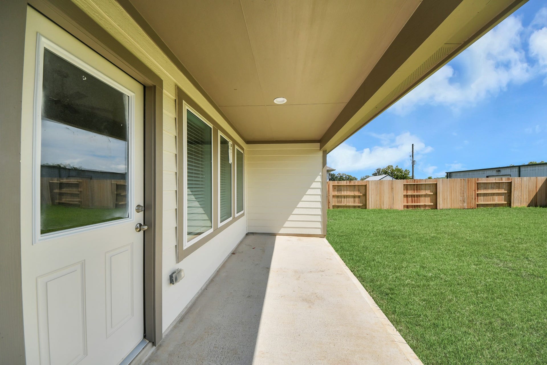 16007 Sycamore Maple Lane, Cypress, TX 77429 Experience outdoor living at its finest on this expansive covered patio, thoughtfully designed for BBQs and delightful outdoor dining.