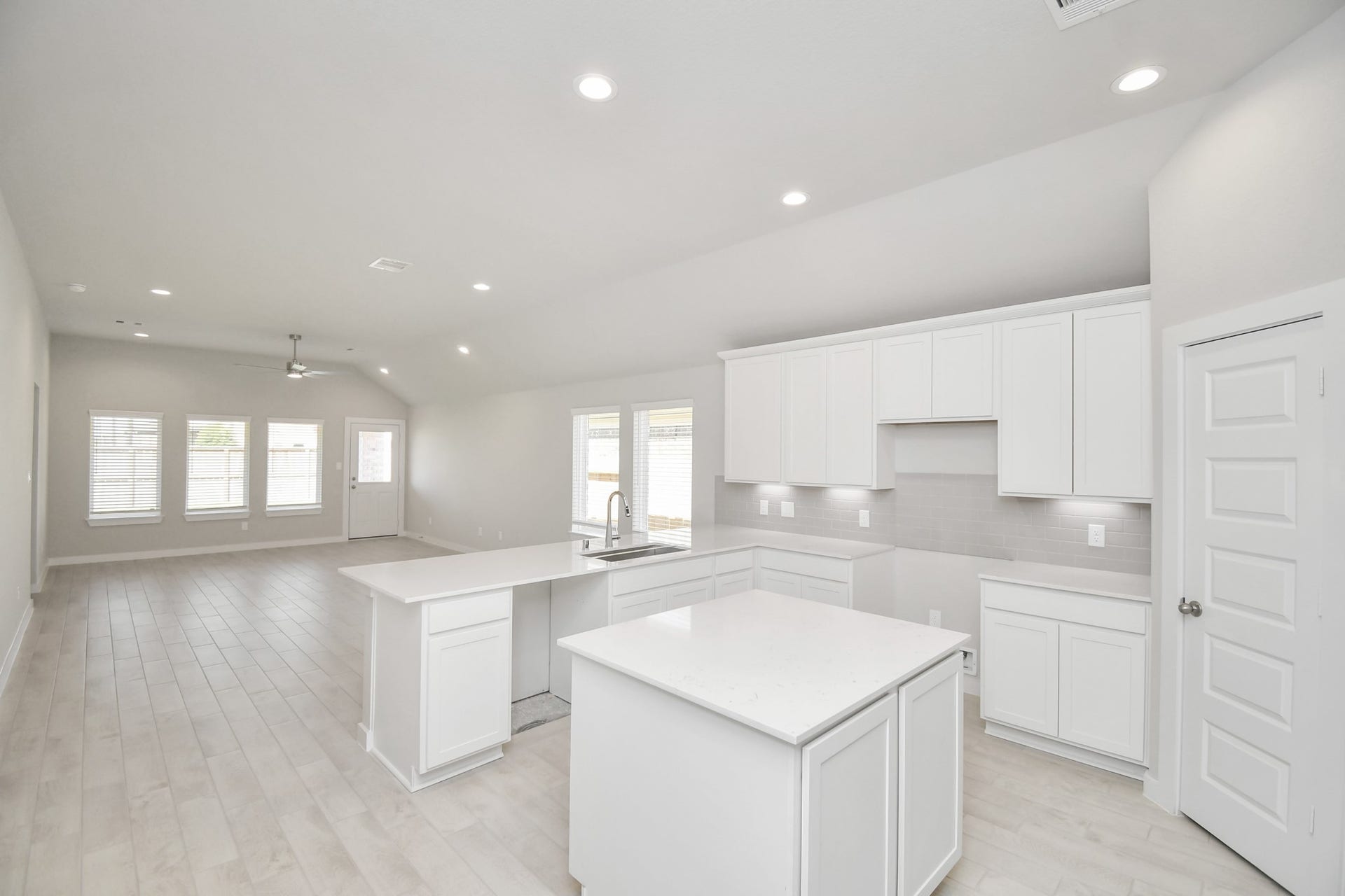 16007 Sycamore Maple Lane, Cypress, TX 77429 All of this overlooks your expansive family room, creating a perfect space for culinary delights and family gatherings. Sample photo of completed home with similar floor plan. Actual colors and selections may vary.