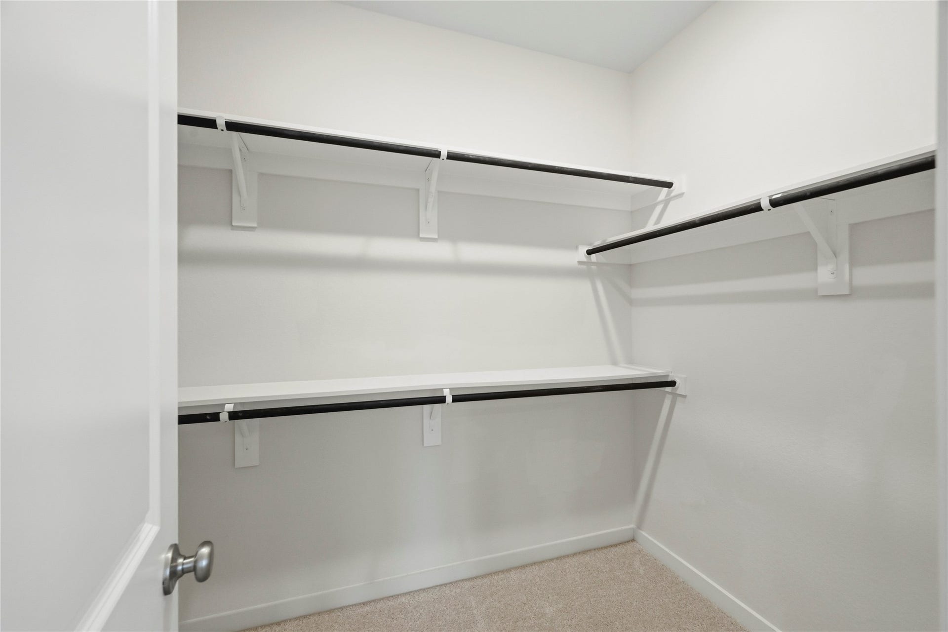 29821 Ellwood Lane, Fulshear, TX 77441 Spacious walk-in closet with built-in shelving and abundant storage.