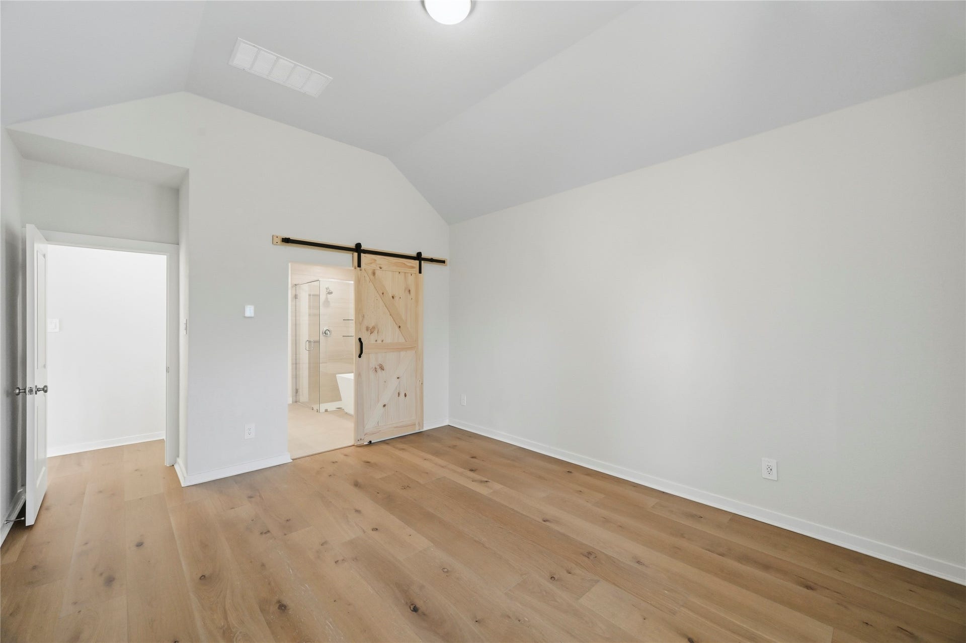 29821 Ellwood Lane, Fulshear, TX 77441 Primary bedroom with direct access to the private ensuite bathroom.