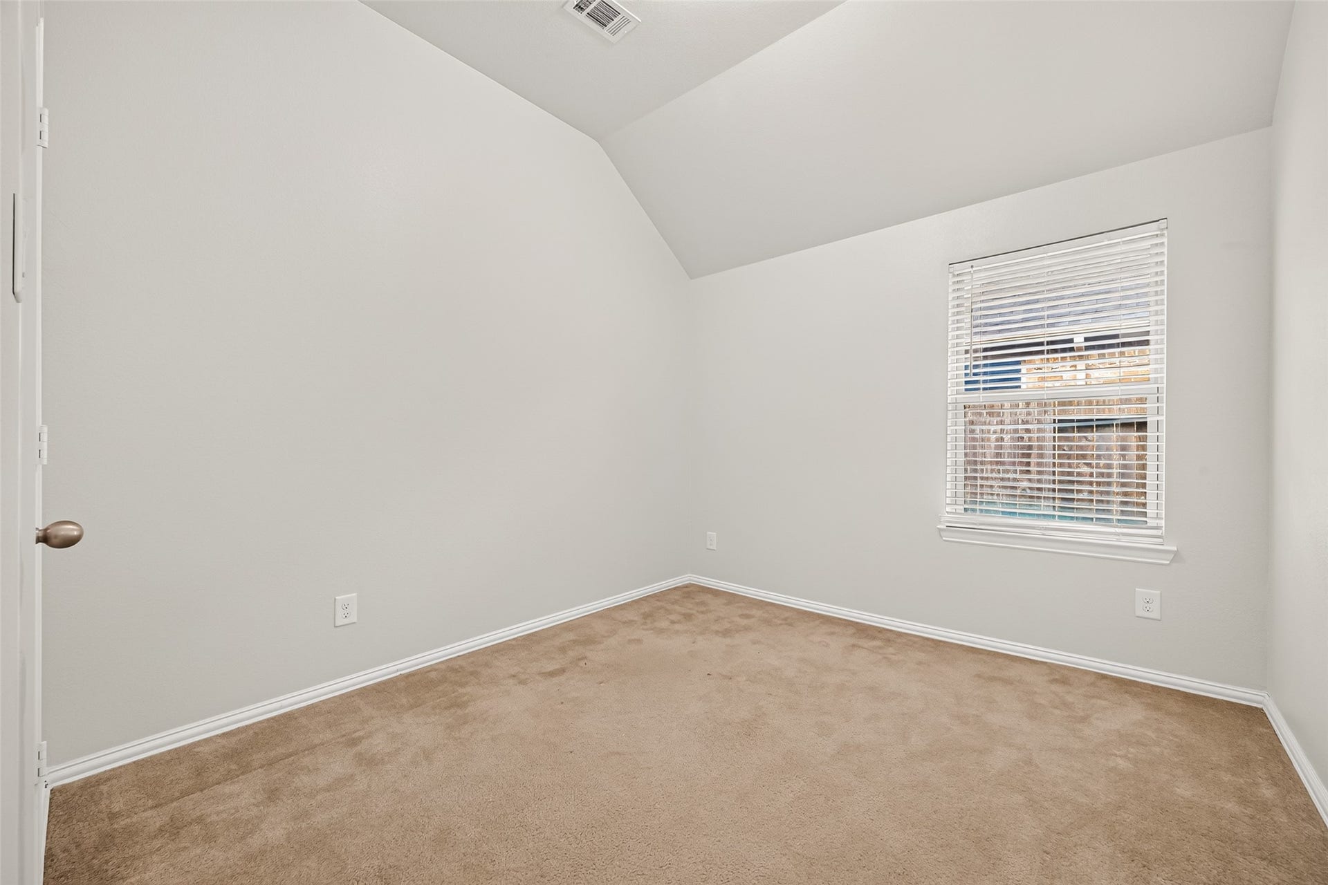 8155 Laughing Falcon Trail, Conroe, TX 77385 Comfortable secondary bedroom 3. No carpet, Laminate flooring now!