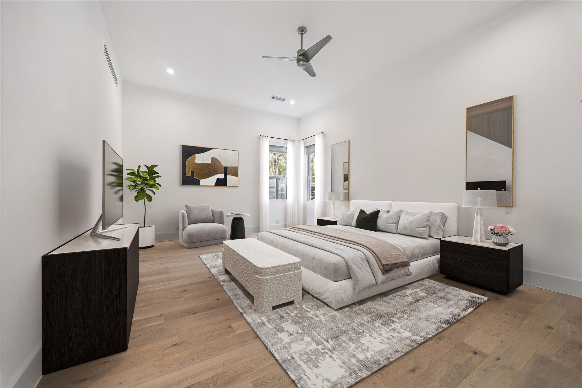 1601 Pine Chase Drive, Houston, TX 77055 Restful primary suite complete with high ceilings, warm wood flooring, large windows, and room for a sitting area. Virtually staged