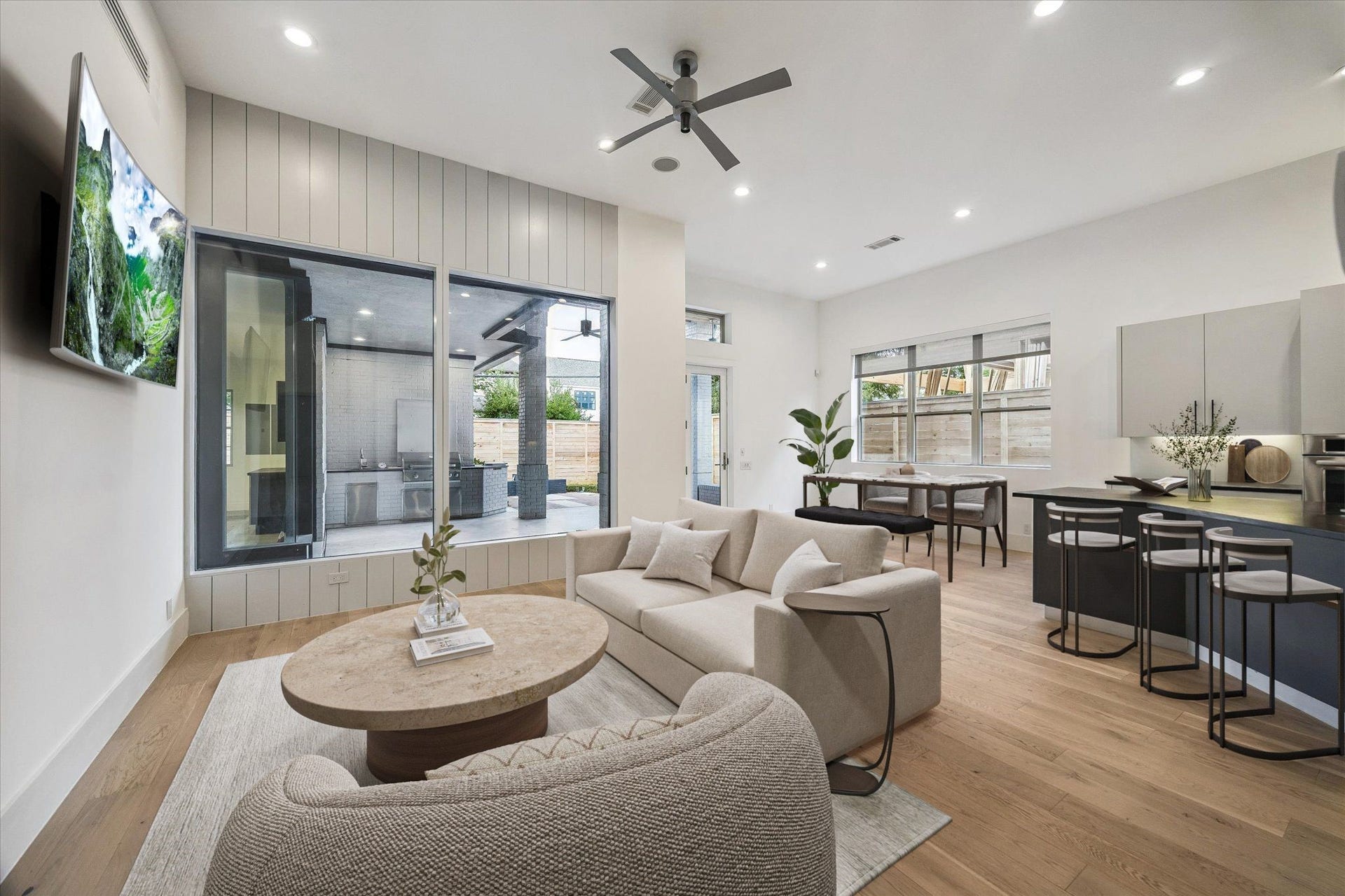 1601 Pine Chase Drive, Houston, TX 77055 Expansive windows framed by vertical shiplap detailing add texture, character & tons of light to the living space. Virtually staged