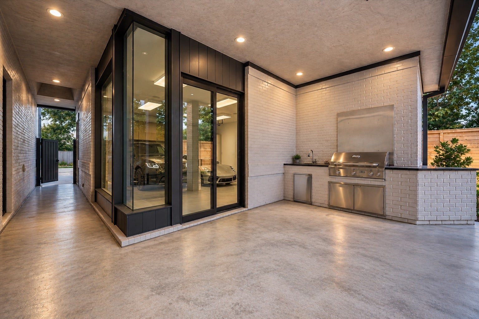 1601 Pine Chase Drive, Houston, TX 77055 The architecture steals the show, dramatic steel-framed glass surrounds the garage