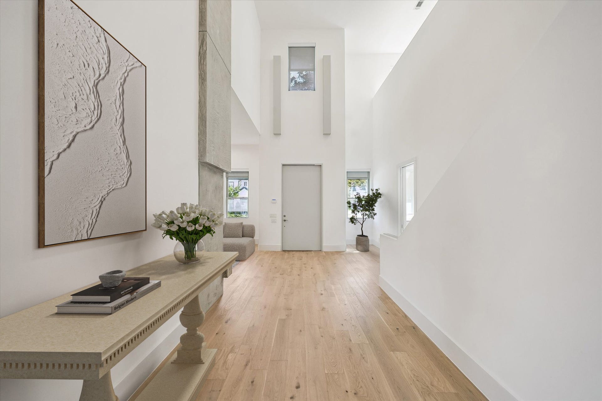 1601 Pine Chase Drive, Houston, TX 77055 First impressions start here, an oversized entry door opens to a soaring two-story foyer filled with natural light and architectural detail. Virtually staged