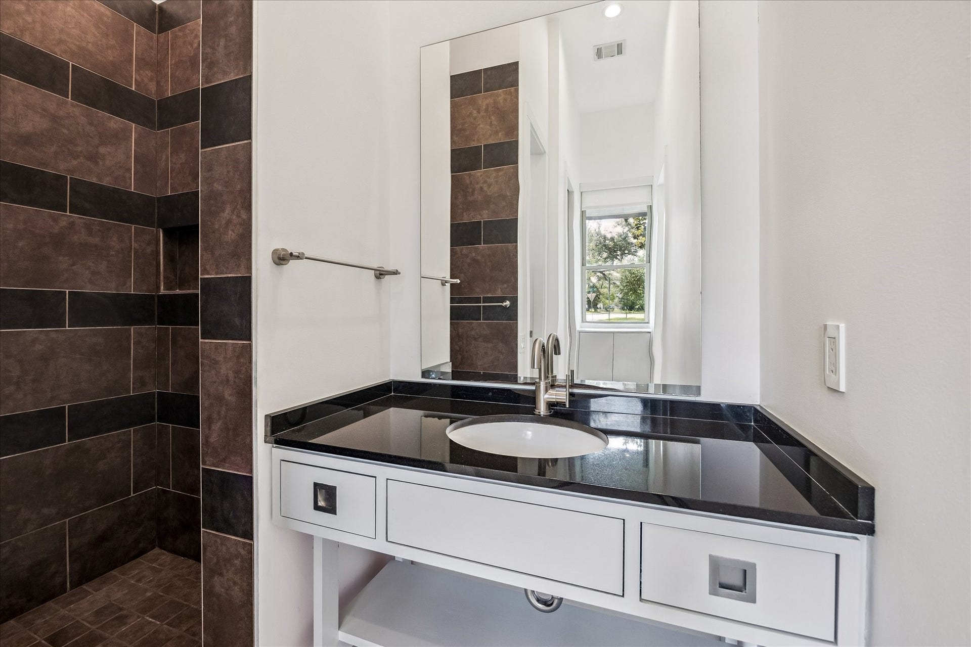 1601 Pine Chase Drive, Houston, TX 77055 The first-floor guest suite continues to impress with a private bath & spacious walk-in shower