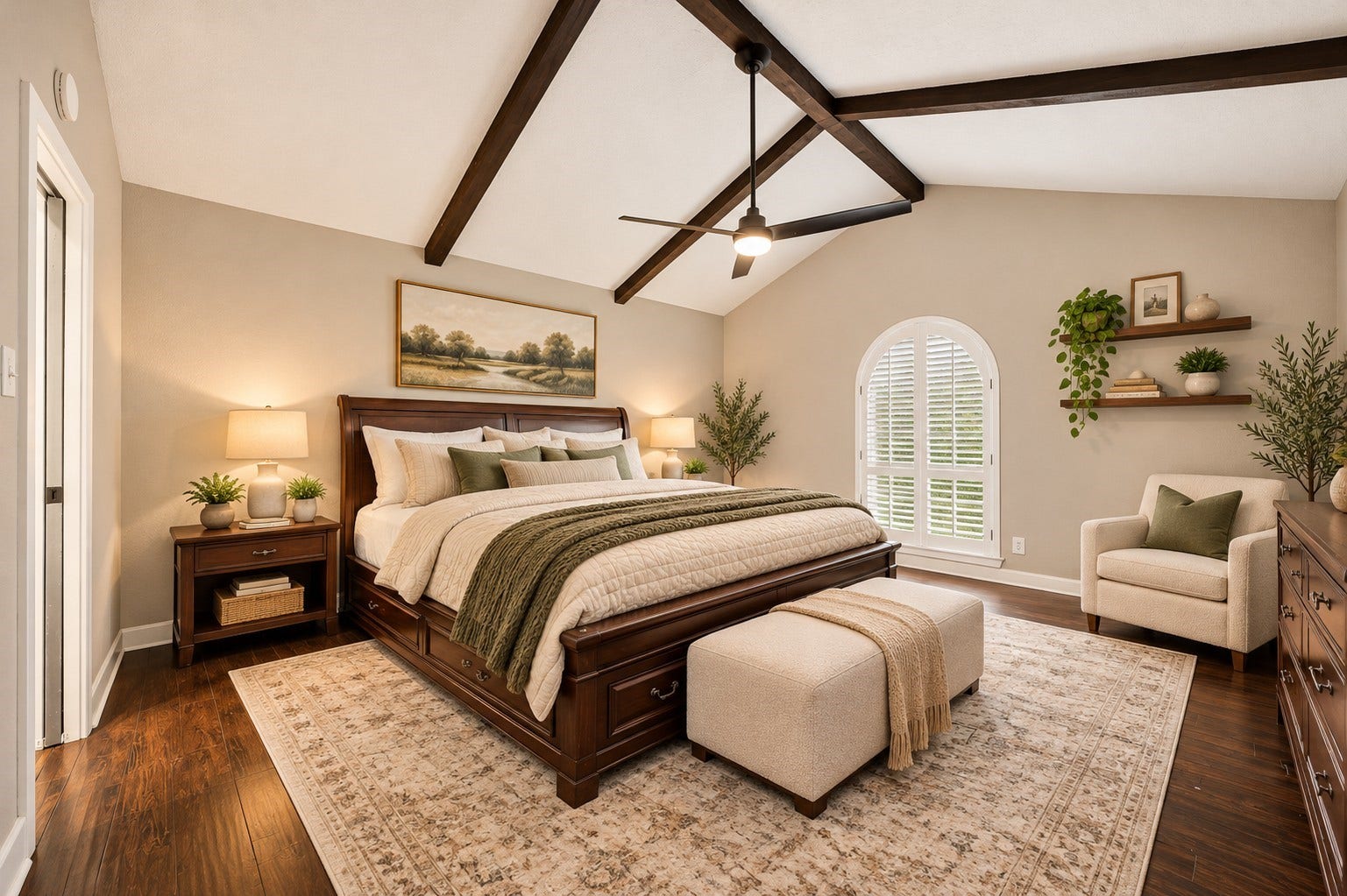 10818 Creektree Drive, Houston, TX 77070 Primary Bedroom (Virtually Staged)
Spacious primary retreat showcasing a stunning vaulted ceiling with exposed wood beams, beautiful wood flooring, and a distinctive arched window with plantation shutters. An elegant space filled with warmth and architectural character.
