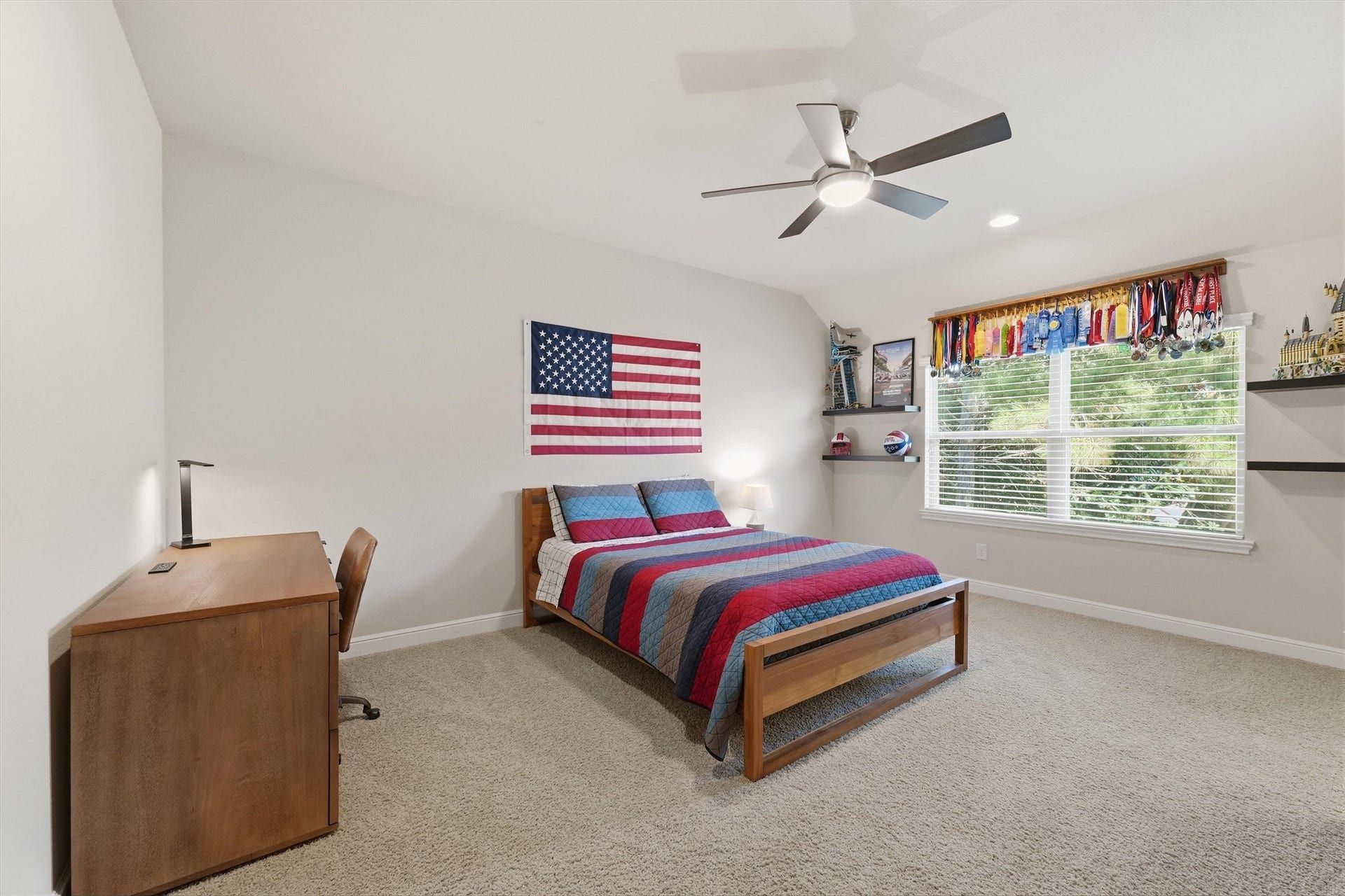 51 S Fremont Ridge Loop, Spring, TX 77389 This generously sized bedroom features a private ensuite bath and convenient access to the game and media rooms.