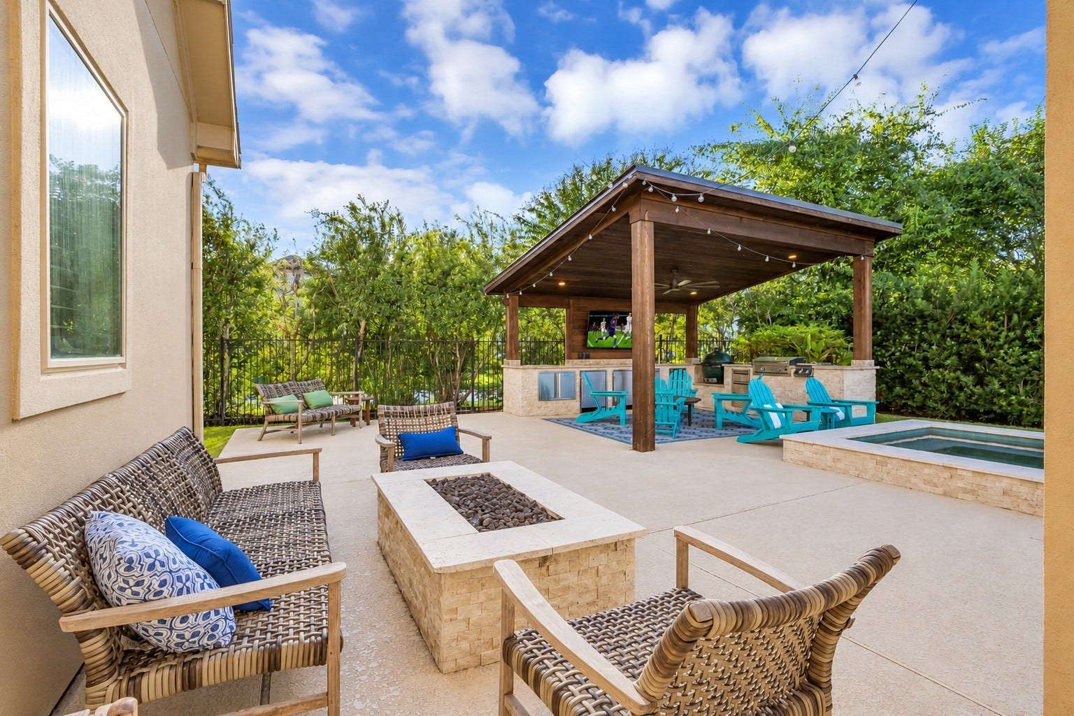 51 S Fremont Ridge Loop, Spring, TX 77389 Generous poolside decking offers multiple sitting areas and a stone-clad gas fire pit for relaxed evenings and outdoor gatherings.