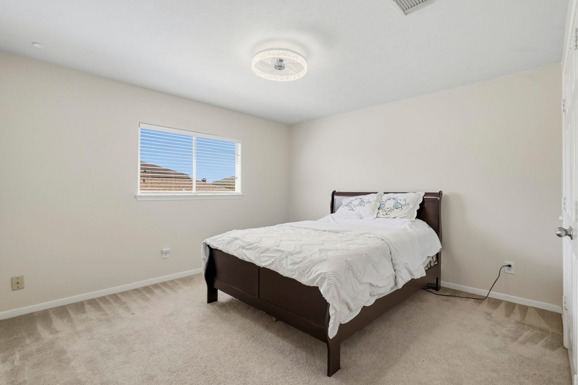 19302 Christine Crossing Drive, Richmond, TX 77407 Bedroom 4 provides additional flexibility for guests, work-from-home needs or everyday living.