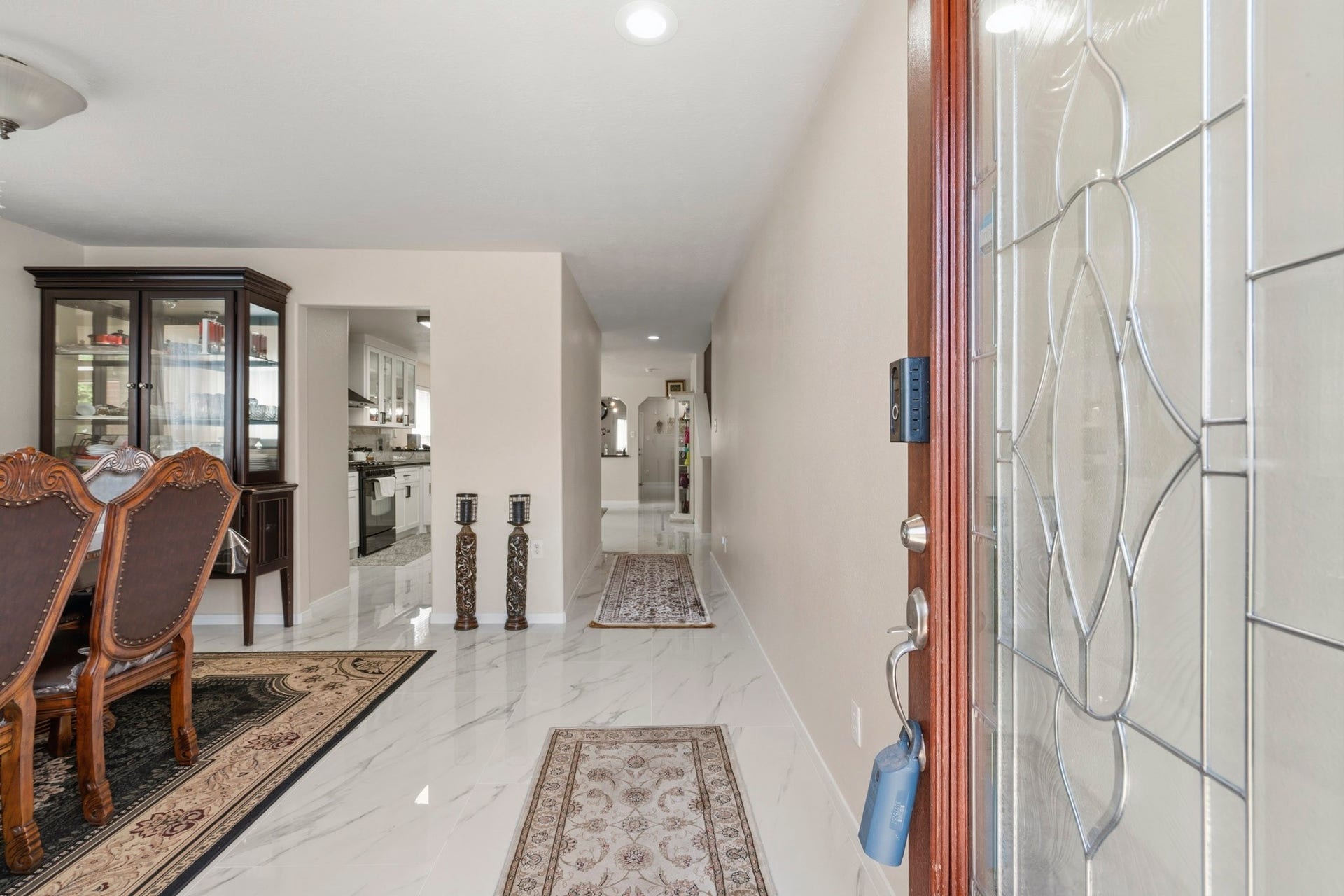 19302 Christine Crossing Drive, Richmond, TX 77407 A bright, welcoming entry introduces the homes open layout and creates an easy flow toward the dining room and main living spaces.