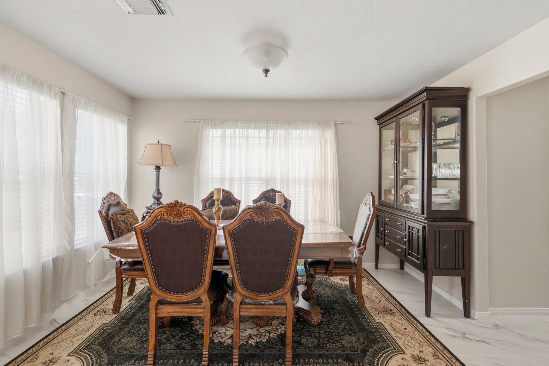19302 Christine Crossing Drive, Richmond, TX 77407 Bright windows and a generous layout make this dining room a welcoming setting for meals, celebrations and memorable conversations.