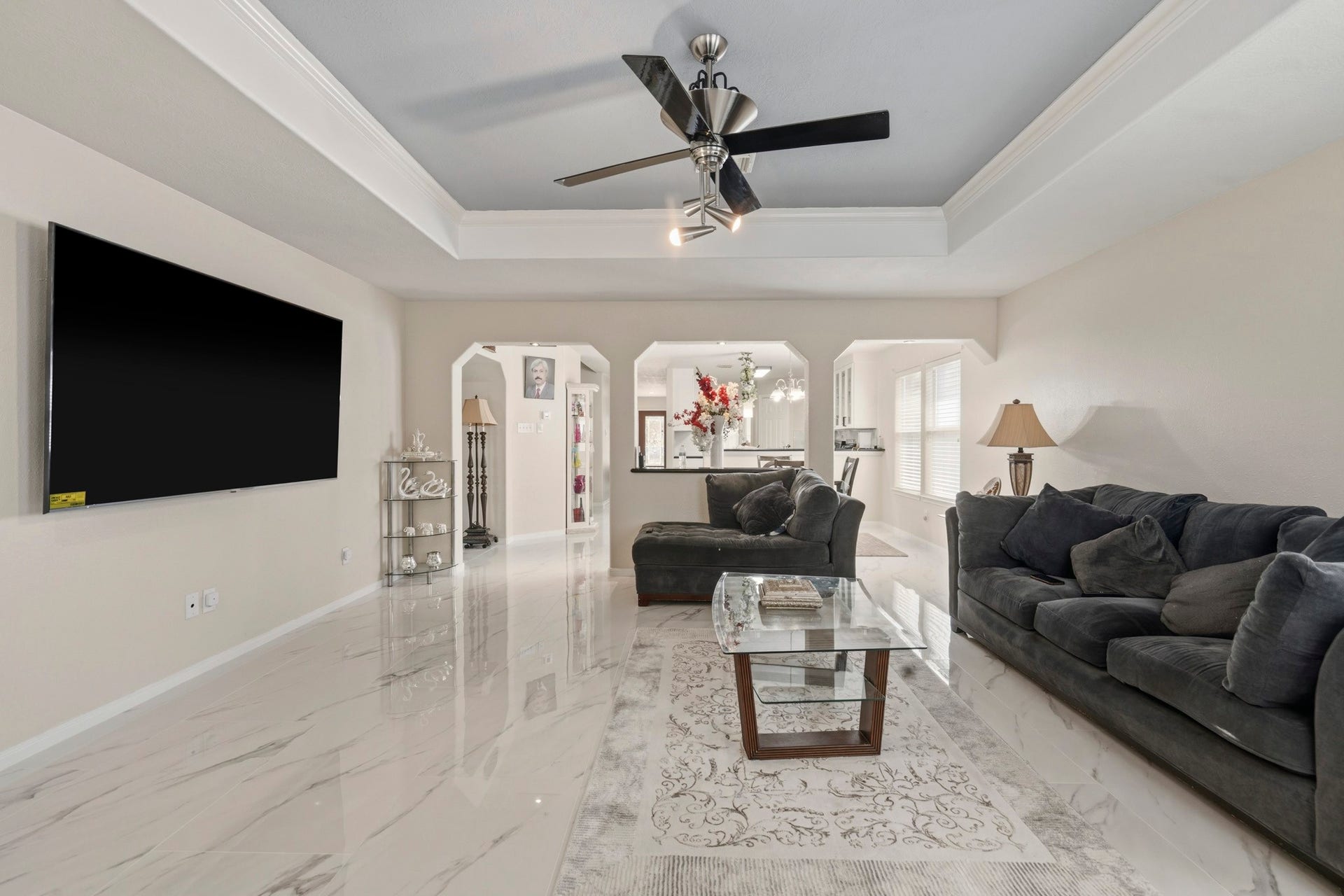19302 Christine Crossing Drive, Richmond, TX 77407 The family room connects easily to the surrounding living spaces, creating a natural flow for hosting and daily routines.