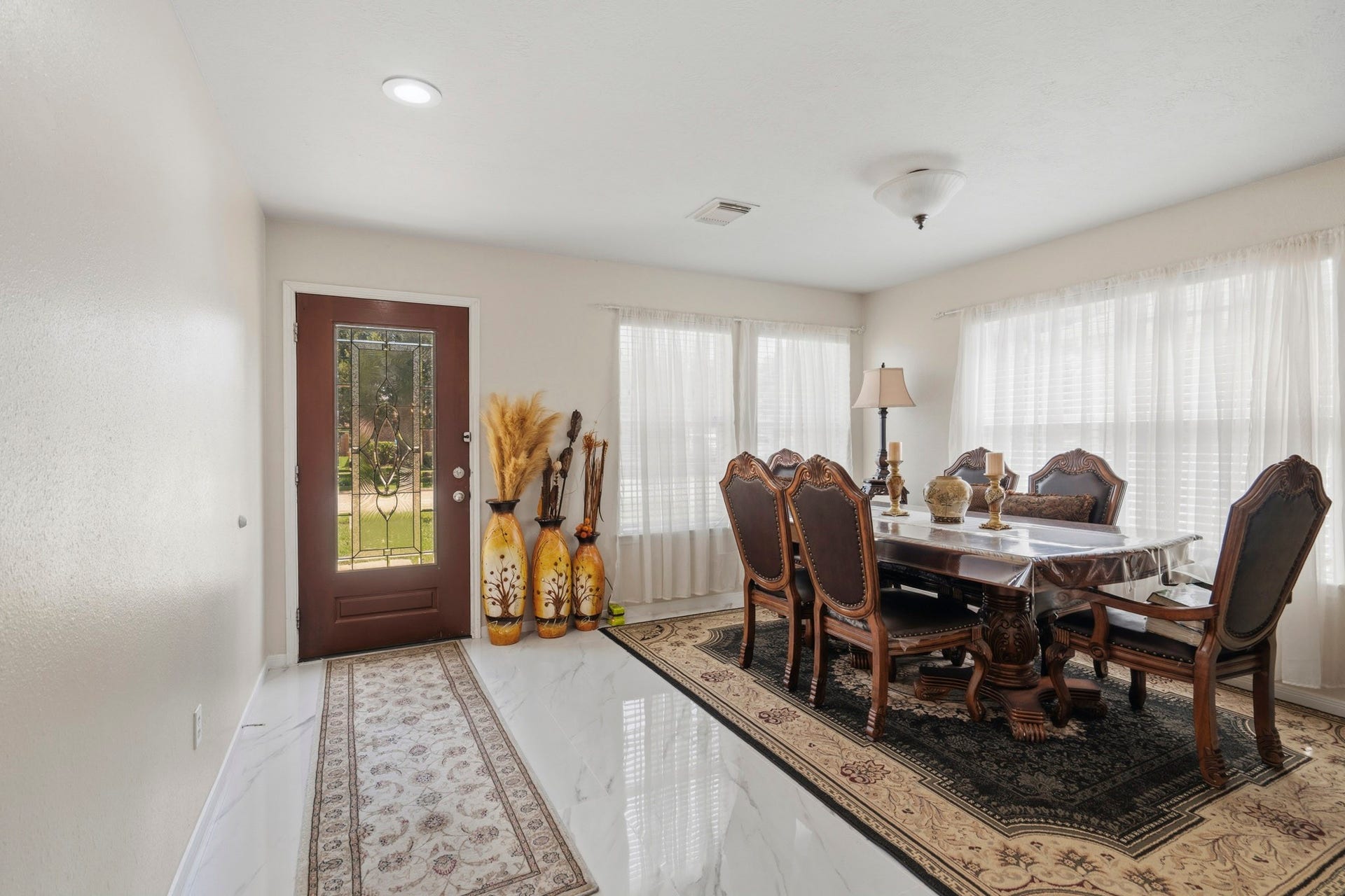 19302 Christine Crossing Drive, Richmond, TX 77407 Gather for holiday meals, dinner parties and special occasions in the spacious formal dining room filled with natural light.