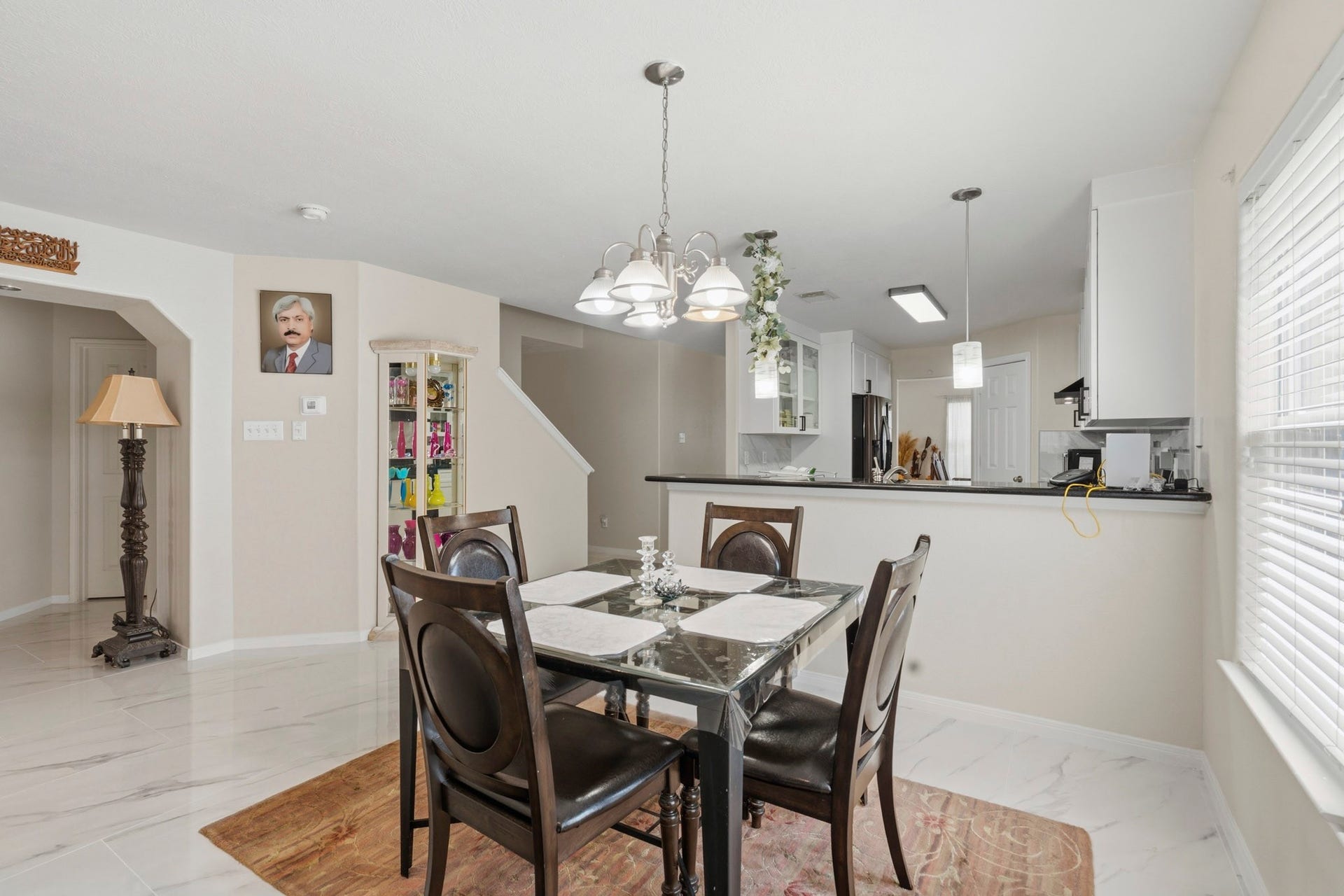 19302 Christine Crossing Drive, Richmond, TX 77407 The open kitchen and breakfast area offer a bright, comfortable gathering space where cooking, dining and conversation naturally come together.