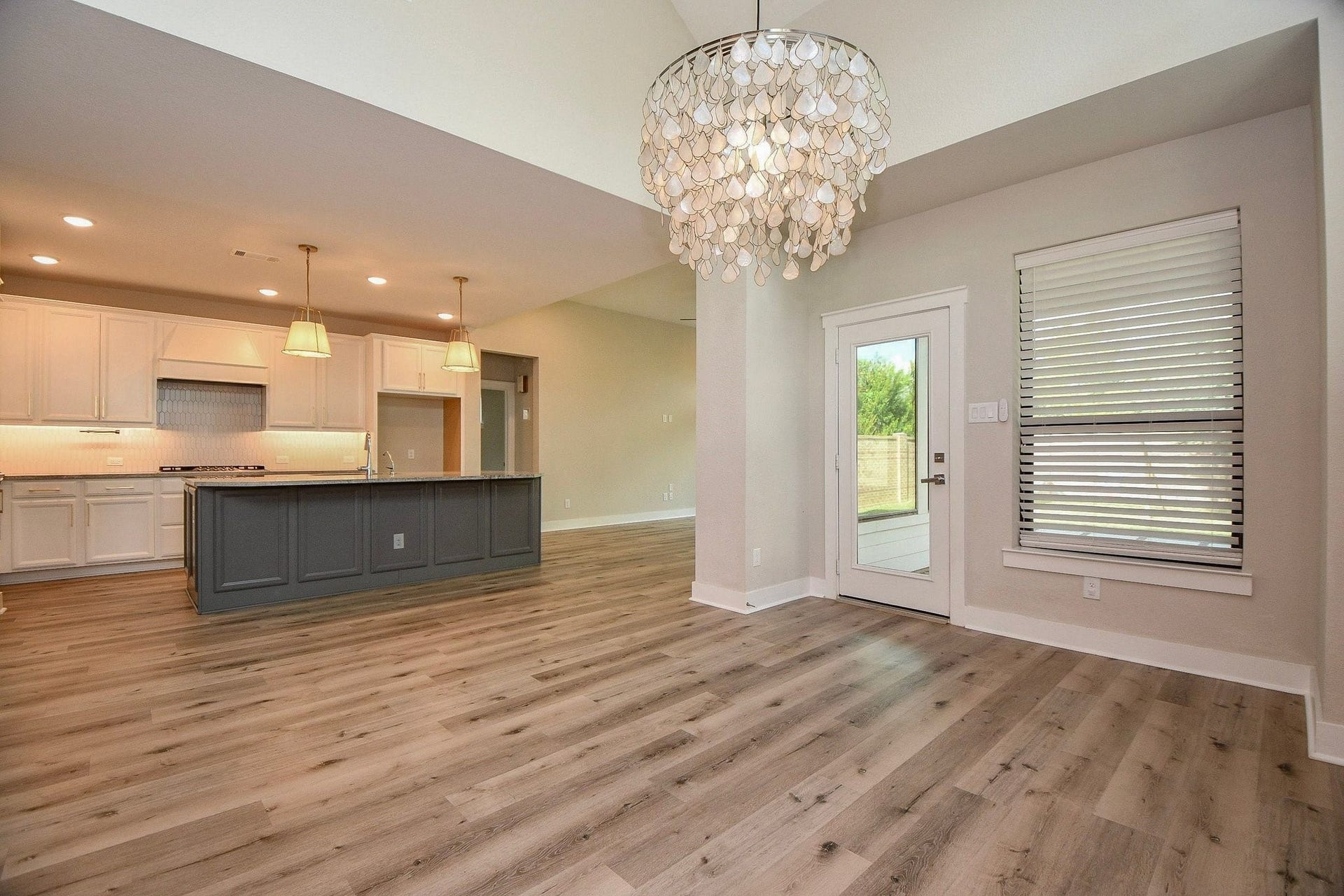15239 Momentous Path, Cypress, TX 77433 Either entertain your guests with open spaces, or keep the littles visible no matter where they are!