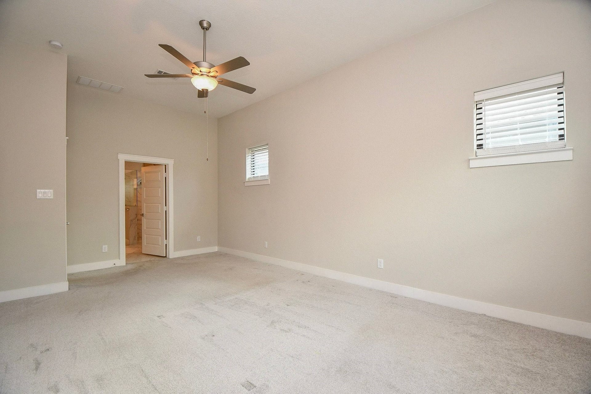 15239 Momentous Path, Cypress, TX 77433 The other end of the primary suite pointing the way into the primary bath, oh and another window!