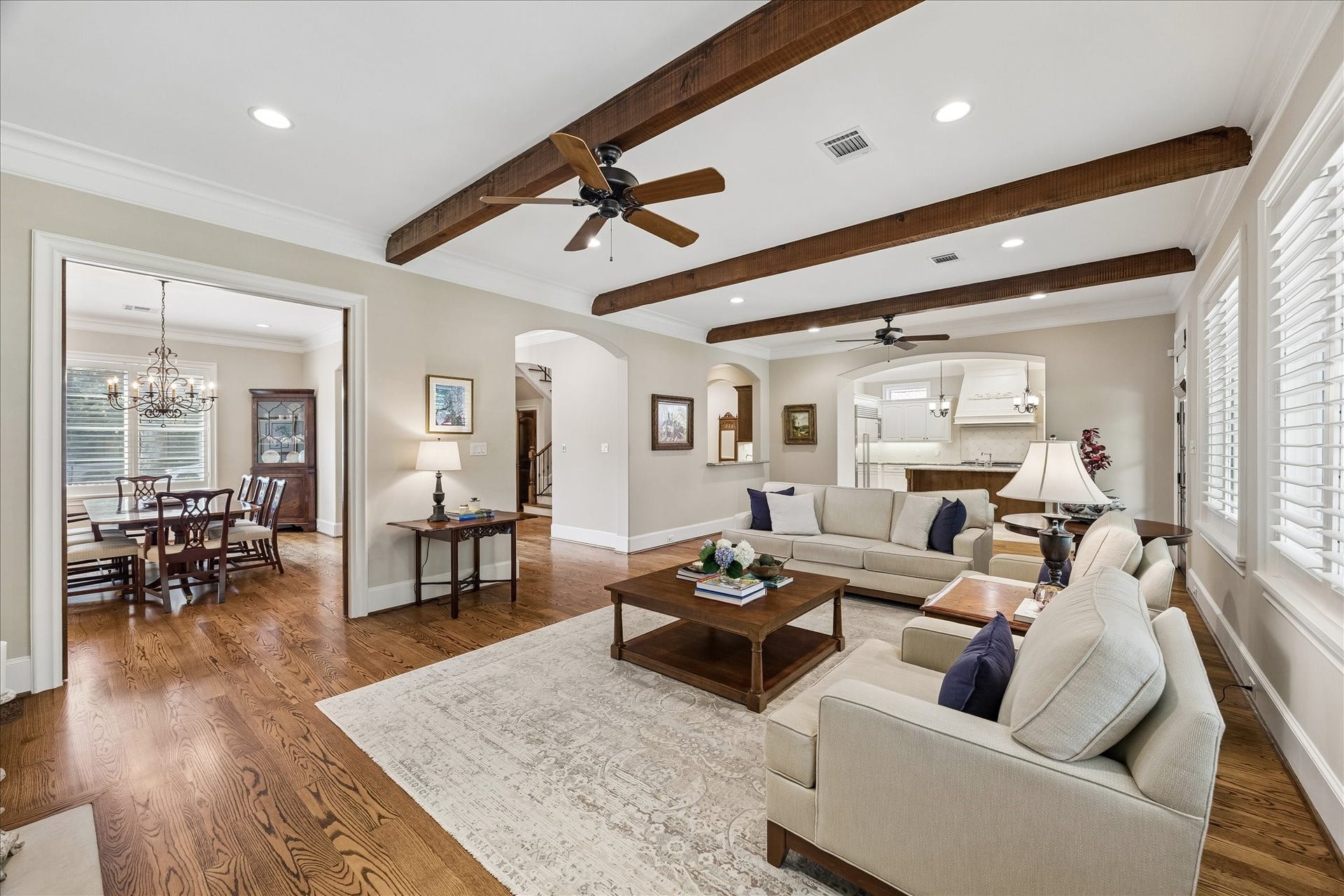 Living room with pocket doors that lead to the dining room.