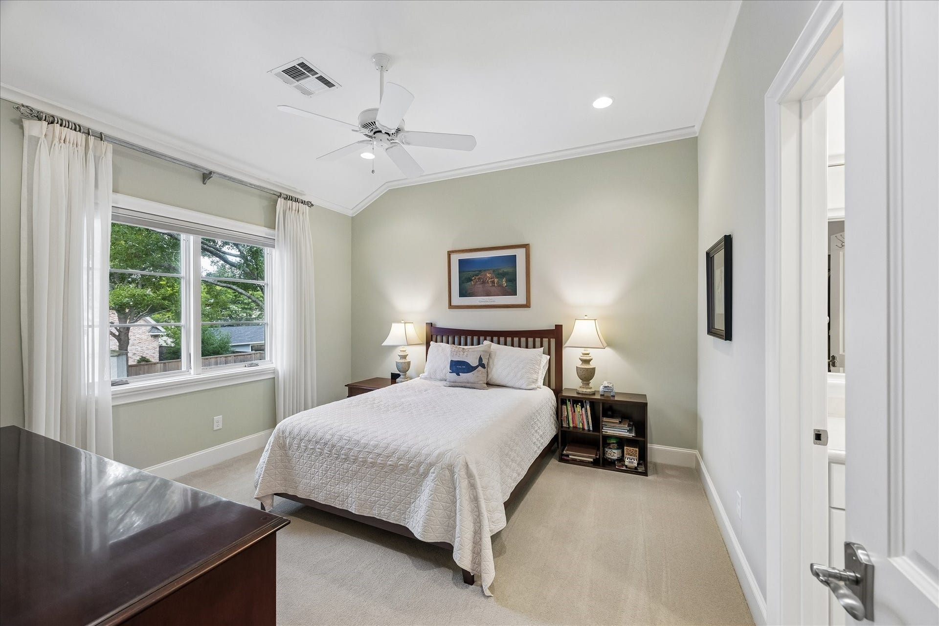 One of three secondary bedrooms - all with private baths, high ceilings and walk-in closets.