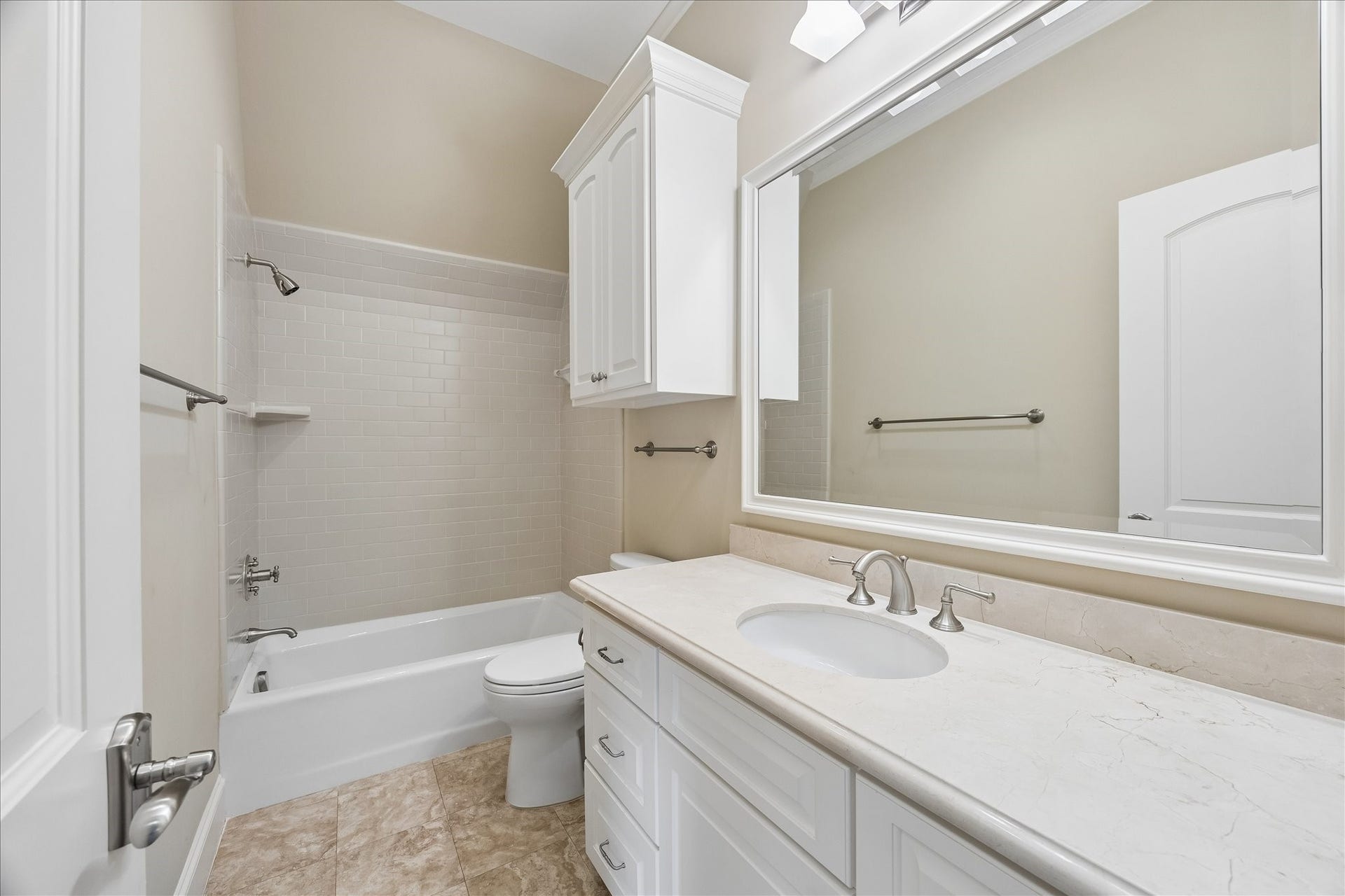 Private bath with shower/tub combo in fourth bedroom/play room.