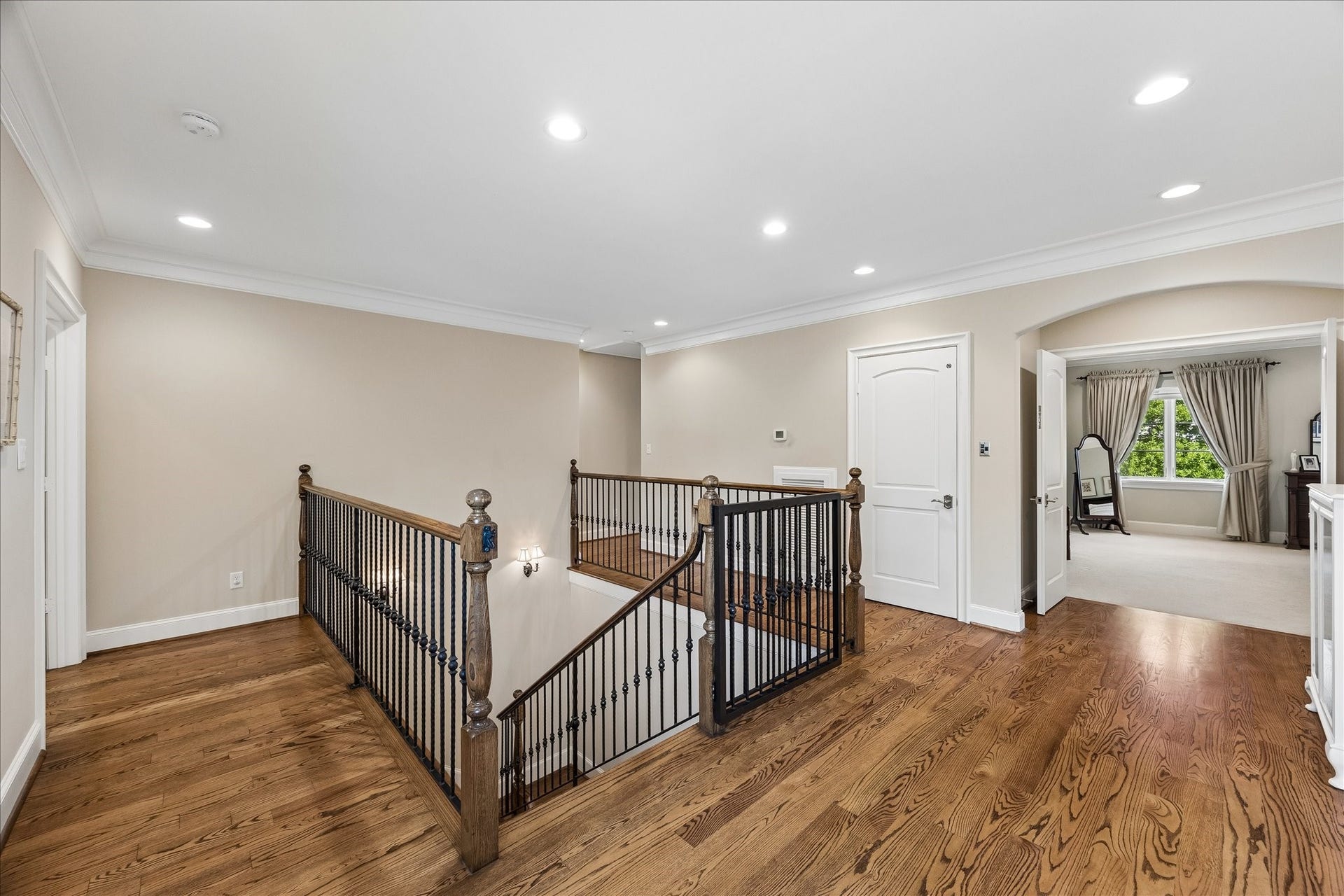 Landing on the second floor that shows where the elevator opens. To the right is the lovely primary retreat and home office.