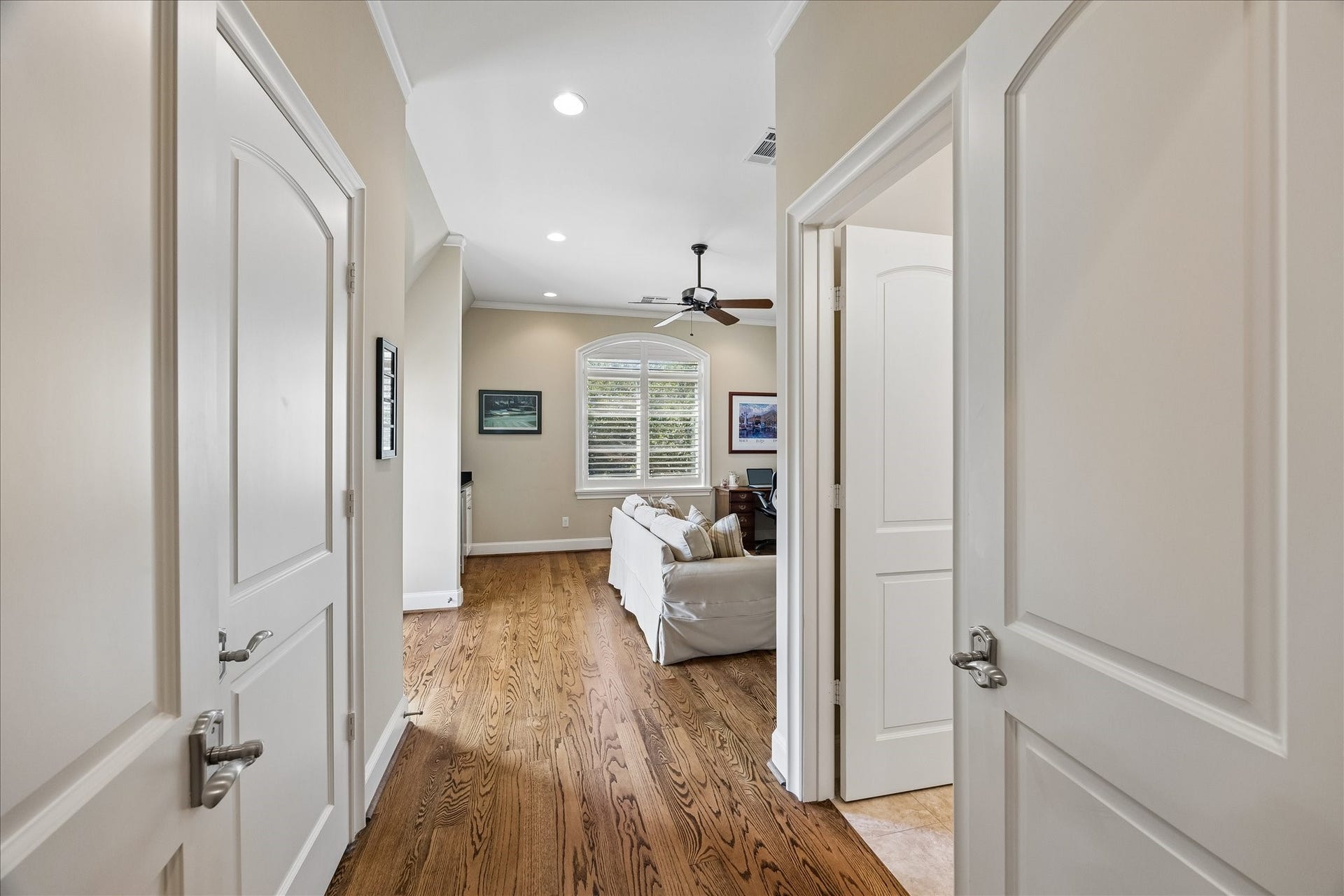 Entryway into the fourth bedroom equipped with a beverage fridge, private bath and balcony. Currently lived as a game room. See next slide for a virtually enhanced option as a teen bedroom.