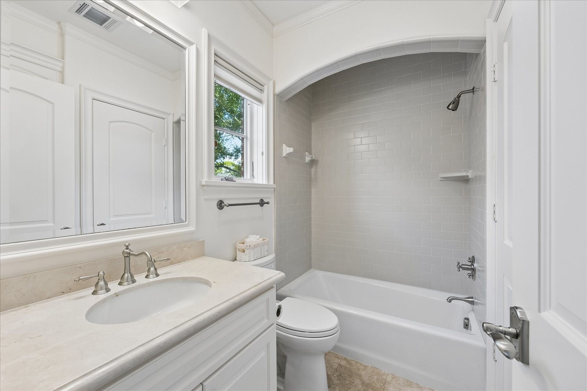 En-suite bath attached to bedroom with walk-in closet (not pictured) to the right.