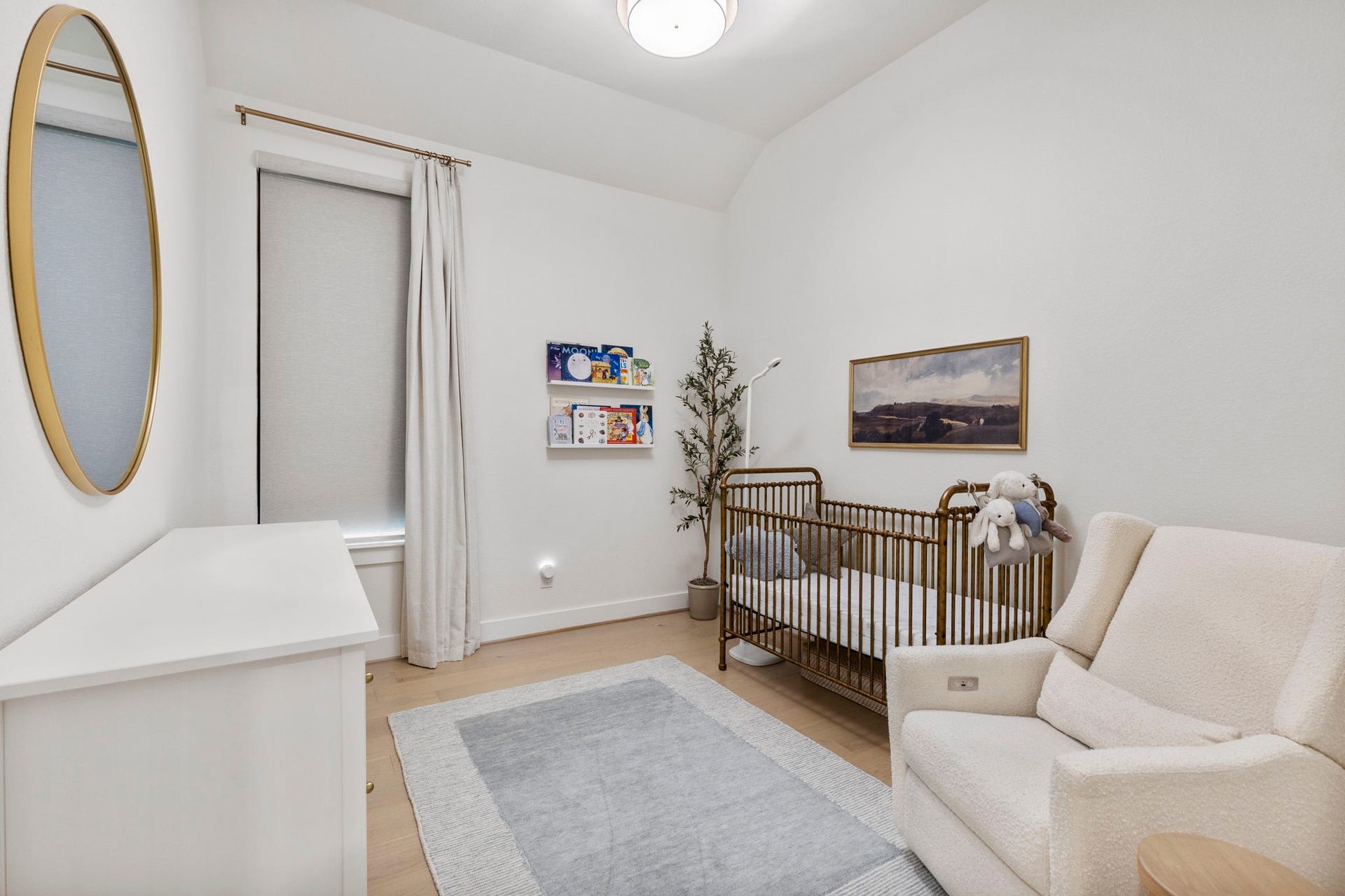 18030 Blu Terrace Drive, Conroe, TX 77302 Bright secondary bedroom with hardwood floors, tall ceilings, and a wide window for natural light.