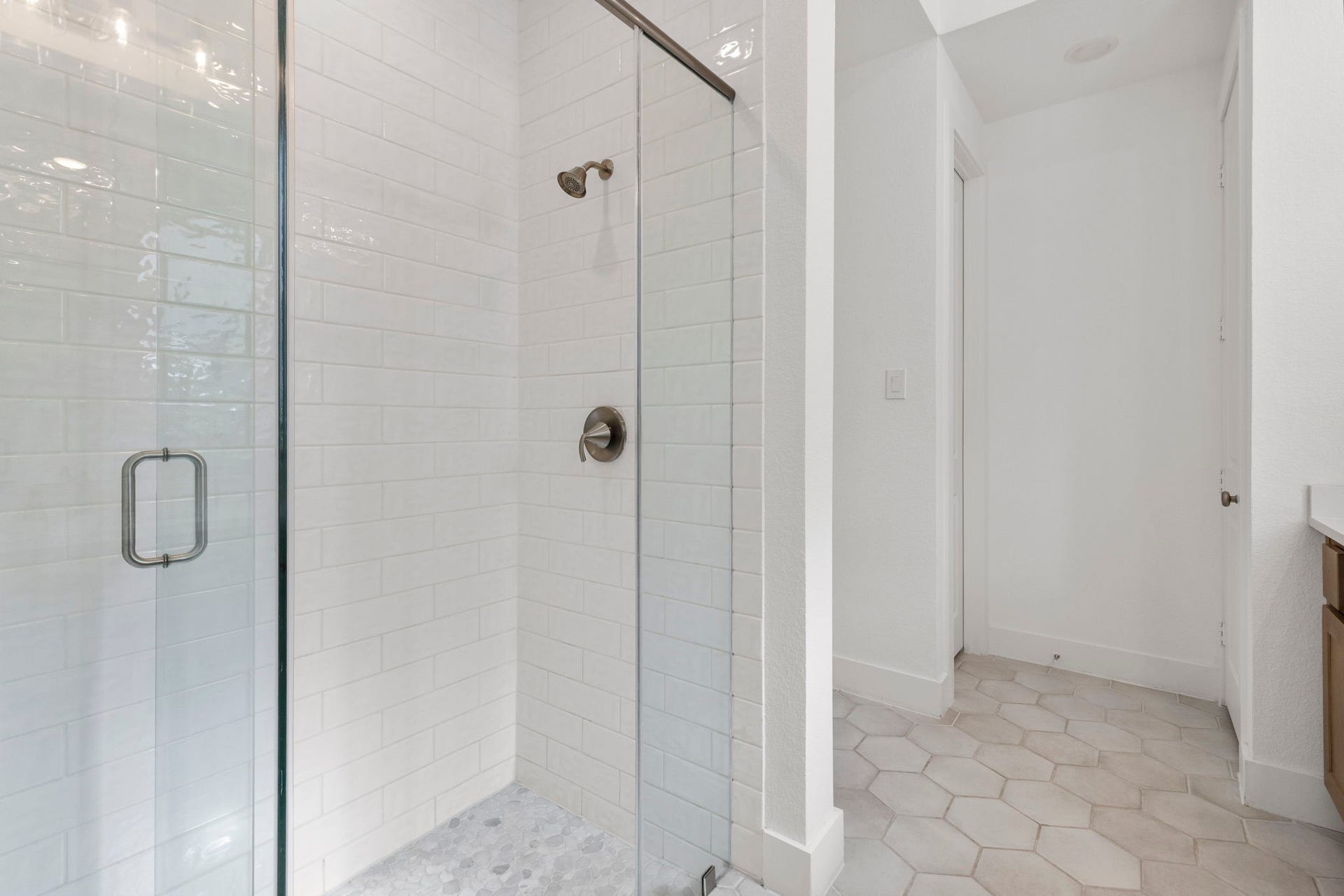 18030 Blu Terrace Drive, Conroe, TX 77302 Frameless oversized glass walk-in shower.
