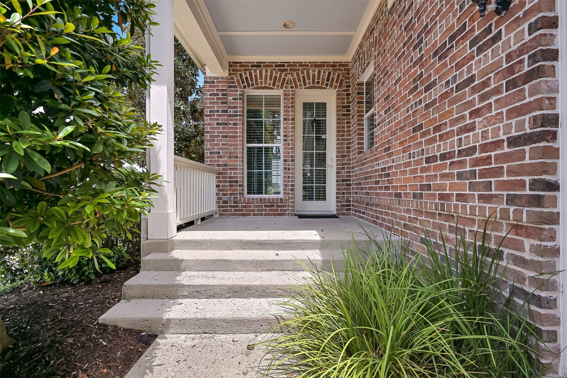 6 Barque Lane, Galveston, TX 77554 2nd entrance on the garage side of the townhome.