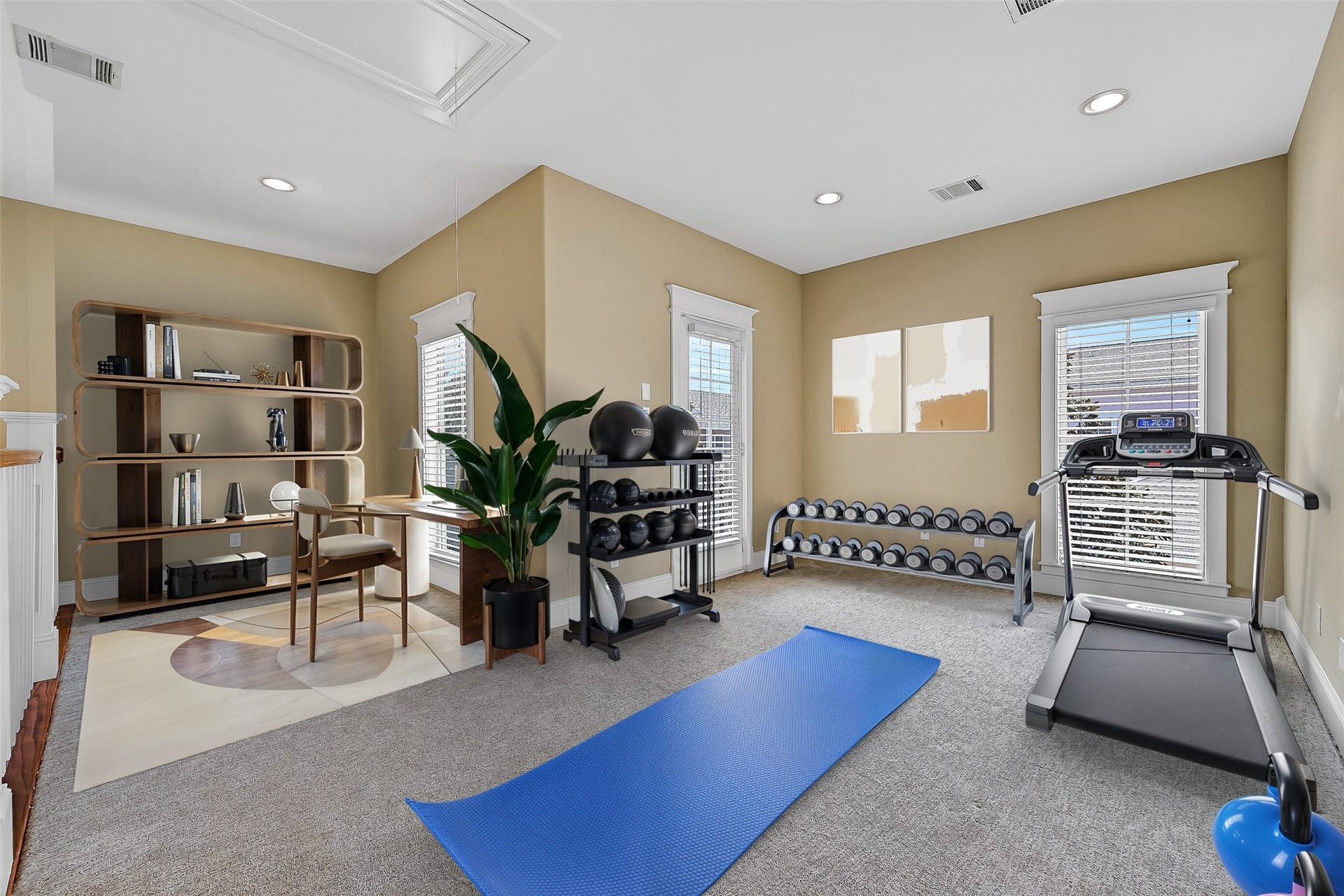 6 Barque Lane, Galveston, TX 77554 Once to the second level landing, we come to this versatile flex space. This could be a workout area, home office, second living area - your choice! This photo is virtually-staged.
