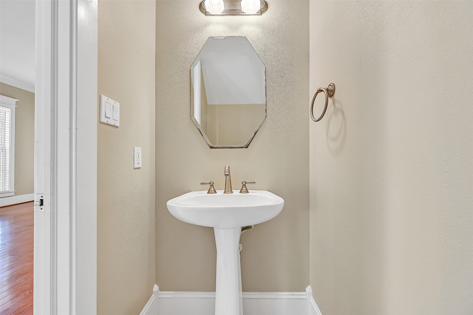 6 Barque Lane, Galveston, TX 77554 Half bath located off of the living area.