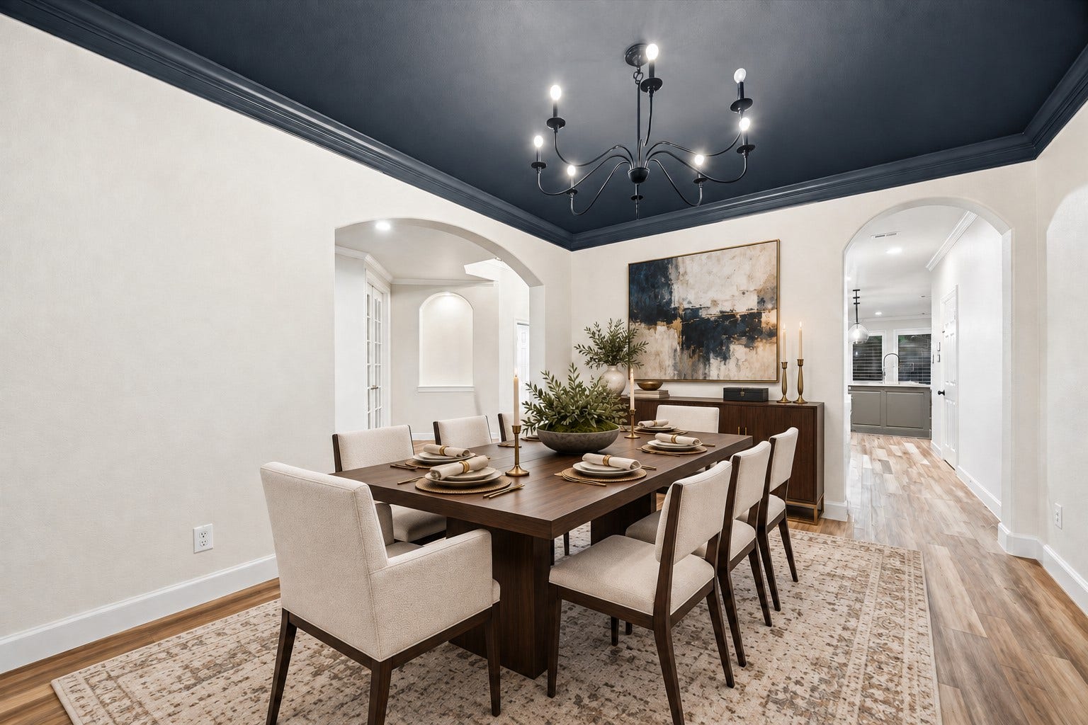 7922 EMERALD HAVEN DRIVE, Sugar Land, TX 77479 ARCHED OPENINGS CONNECT THE FORMAL DINING ROOM TO THE KITCHEN AND MAIN LIVING AREAS, CREATING AN EASY FLOW FOR ENTERTAINING. **Virtually Staged.
