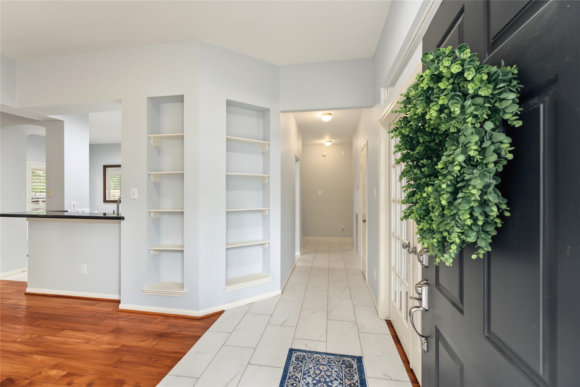 51 S Spiral Vine Circle, The Woodlands, TX 77381 Welcoming entry with built in shelving
