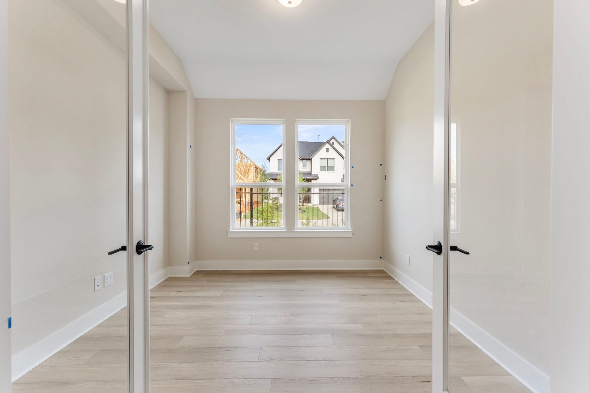 8143 Fenway Heights Dr, The Woodlands, TX 77389 Glass french doors open up to create a flex space that can be used as game room, TV room or study.
