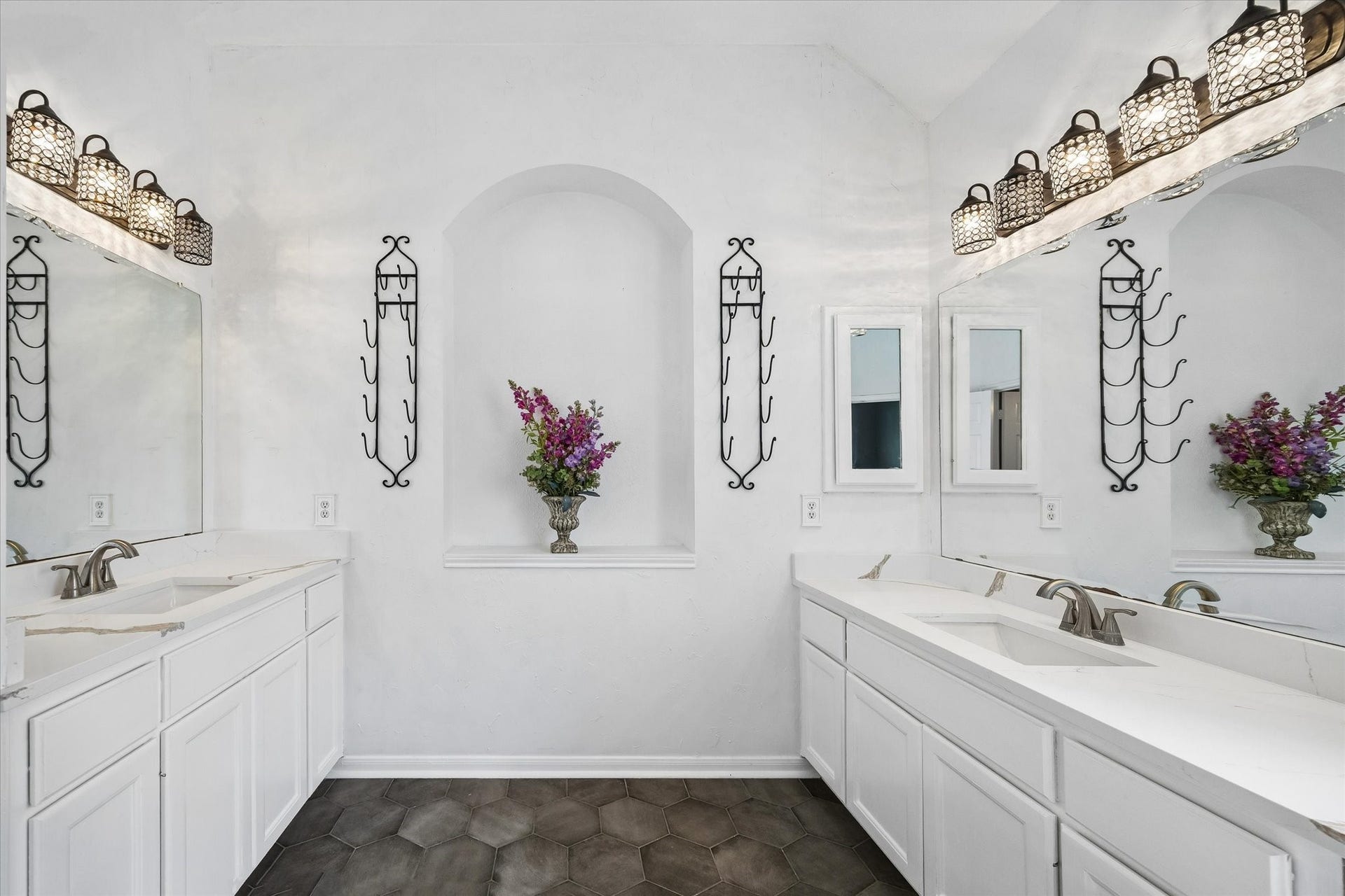 Enjoy the comforts of a private spa in the elegant primary en suite, featuring dual quartz vanities, a beautifully finished walk-in stone shower, and a relaxing jetted tubperfect for beginning and ending your day in comfort.