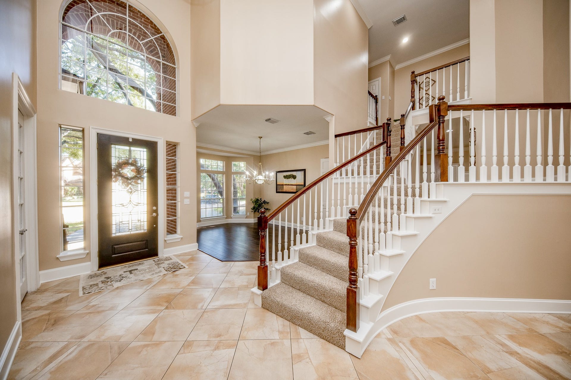 23014 Laguna Point Drive, Katy, TX 77450 Simplicity equals universal elegance, here, as an example of views to come. Here's the divine view from the interior front entry, with NEW rich wood flooring, complemented by FRESH interior paint in sublime earth tones. High ceiling, tremendous natural light and designated front areas galore, are just teasers for the beauties to come in this one-of-a-kind residence.