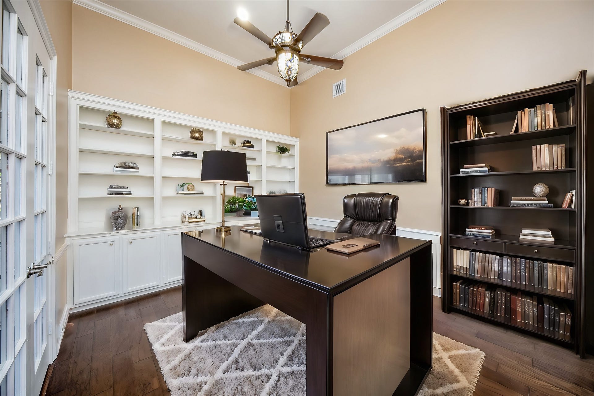 23014 Laguna Point Drive, Katy, TX 77450 Here's another striking view of the 1st floor 'home office' beyond french doors, with a wall of built-in shelving/cabinetry to host an array of books and/or favorite trophies, awards, and family treasures.