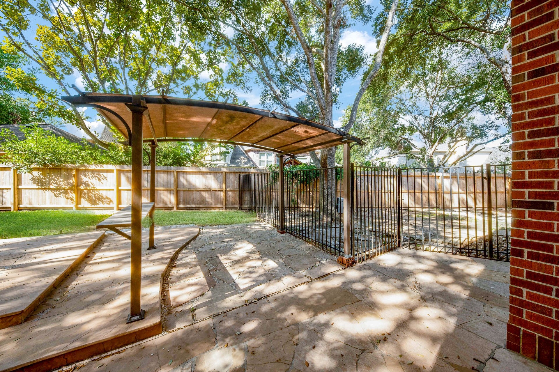 23014 Laguna Point Drive, Katy, TX 77450 How lovely! A delicate pergola covers a gathering spot!