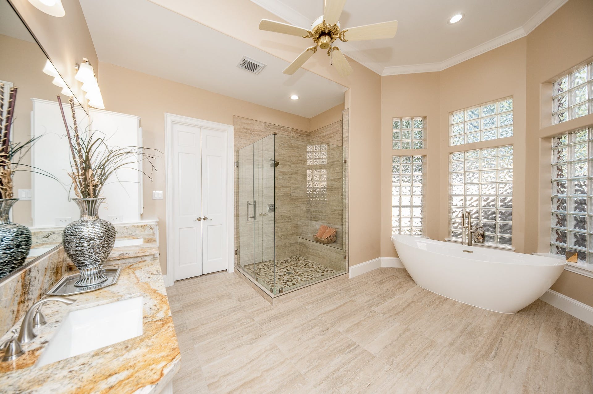 23014 Laguna Point Drive, Katy, TX 77450 Choose a long luxurious soak or a brisk, refreshing shower in your divine primary bath suite, after move in day come to a close!