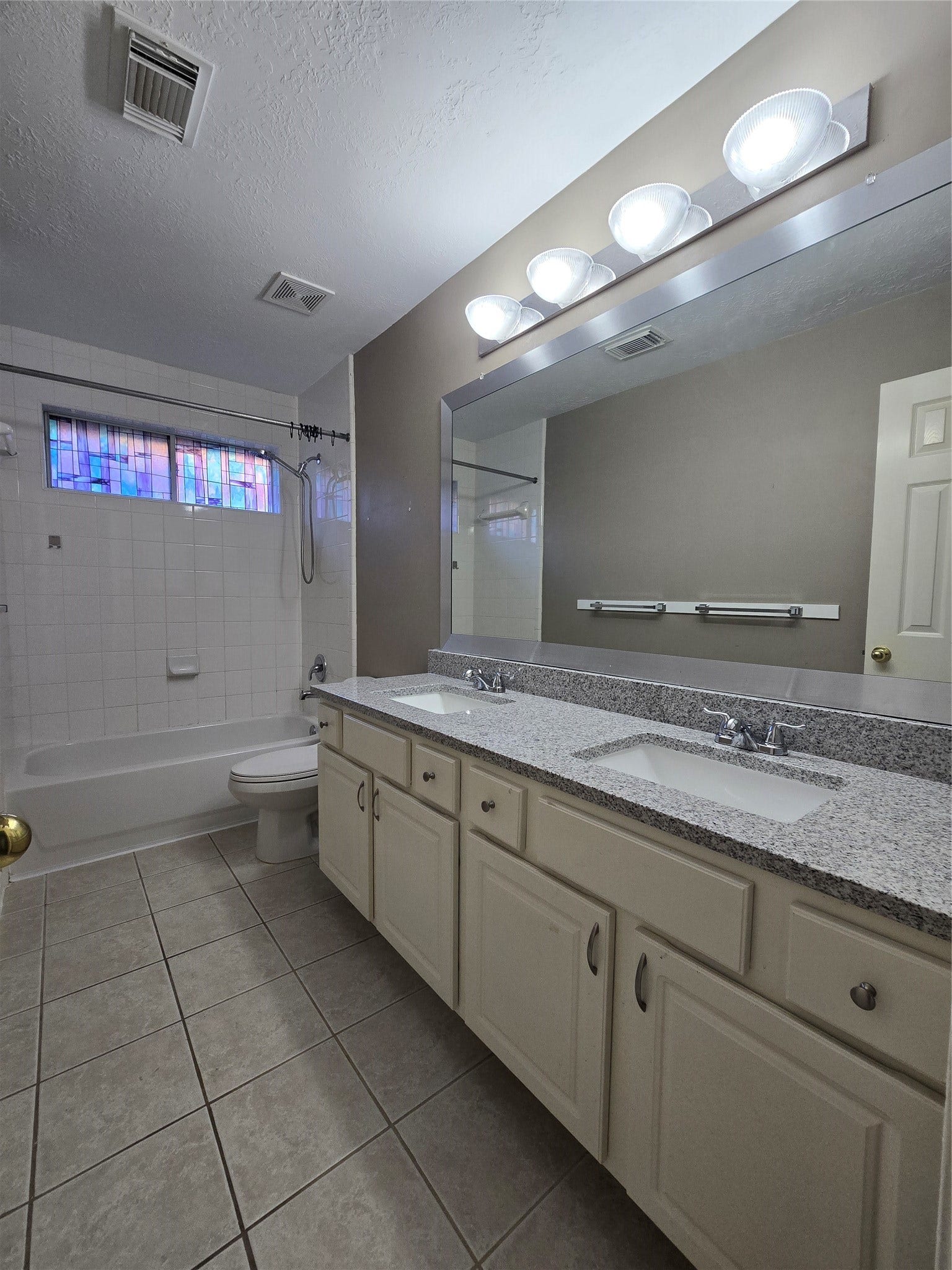 Recently updated granite vanity top, sinks, and faucets