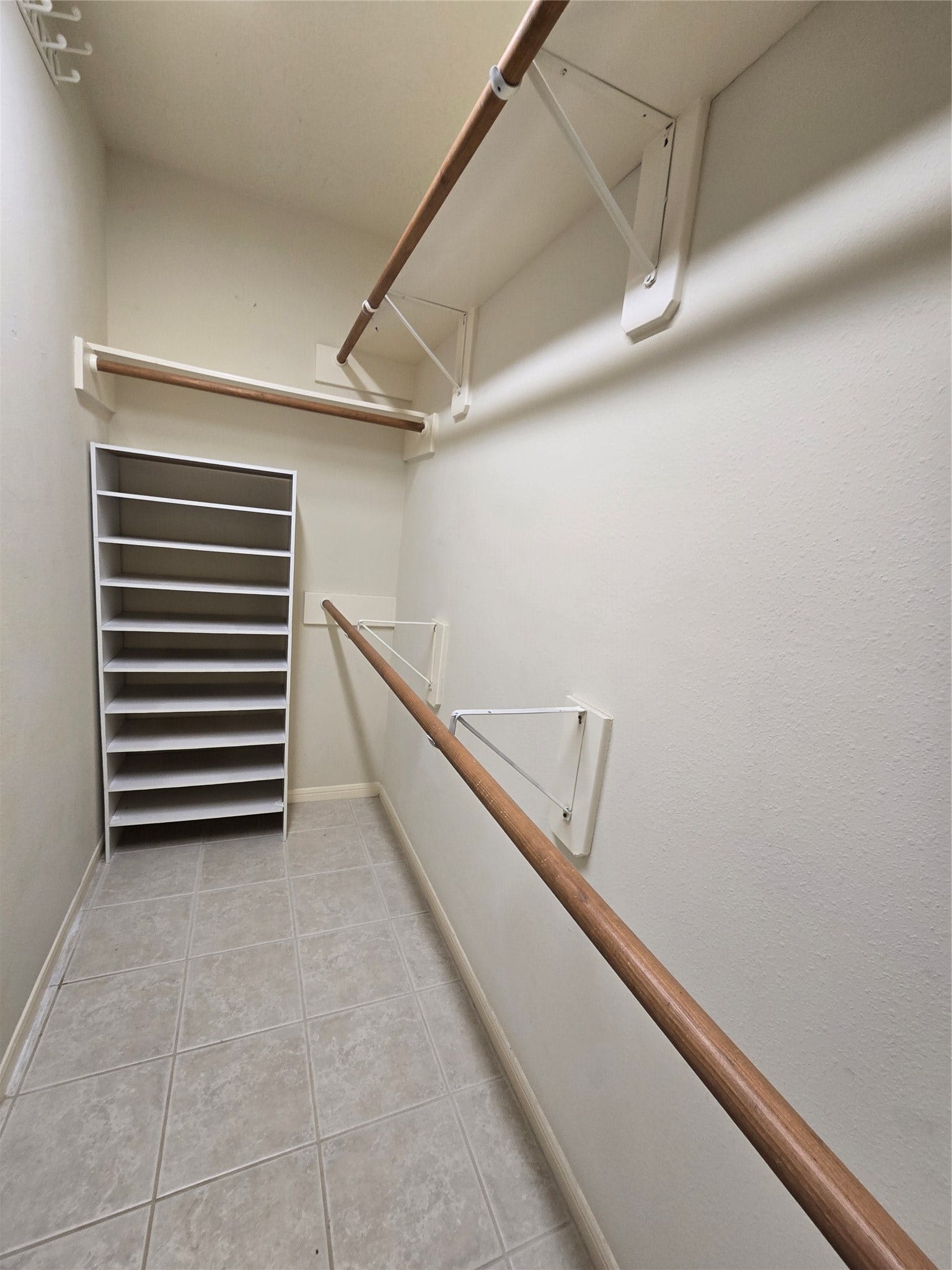 Primary closet - shoe shelf stays