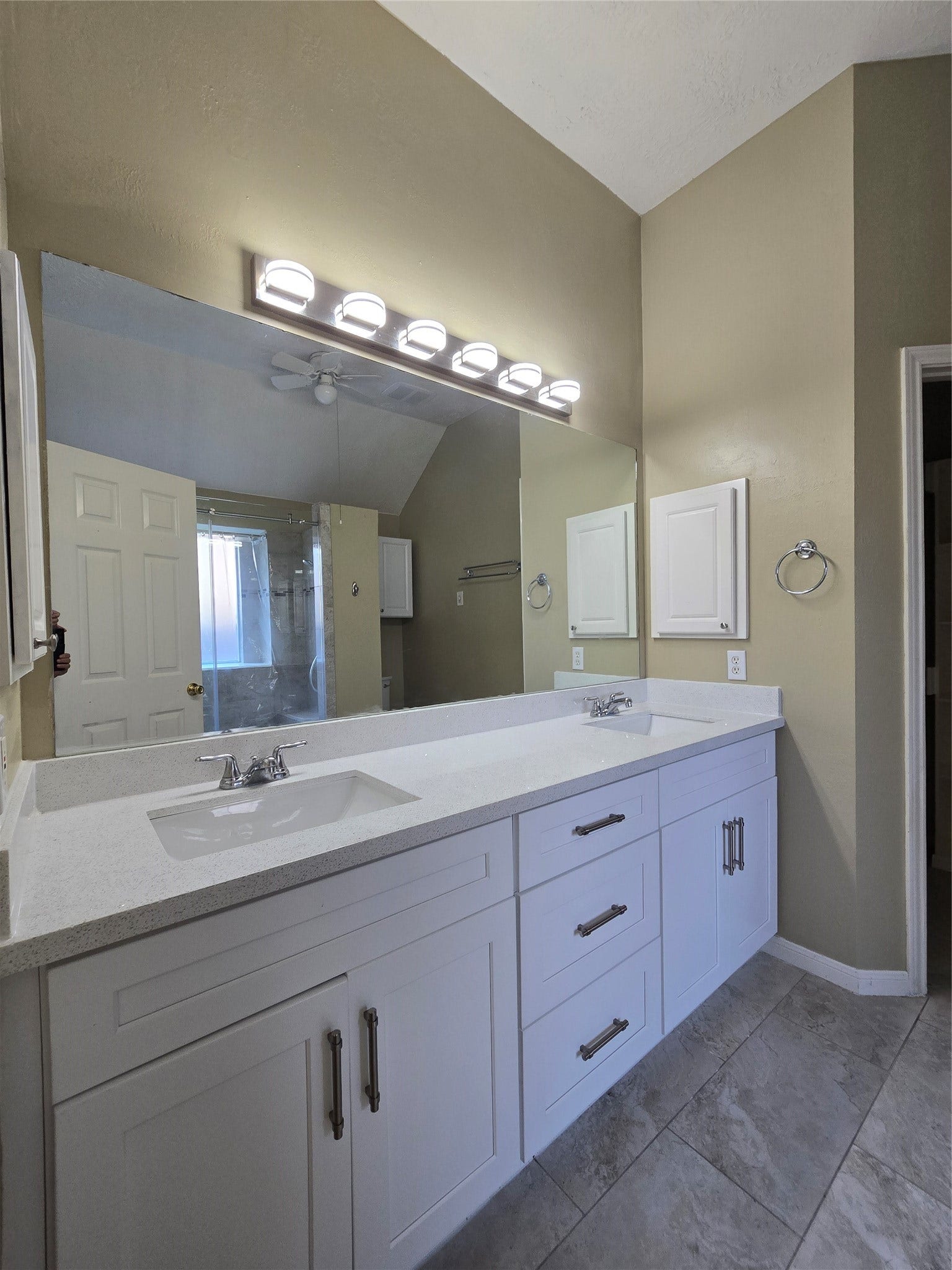 Recently updated vanity cabinets with quartz top