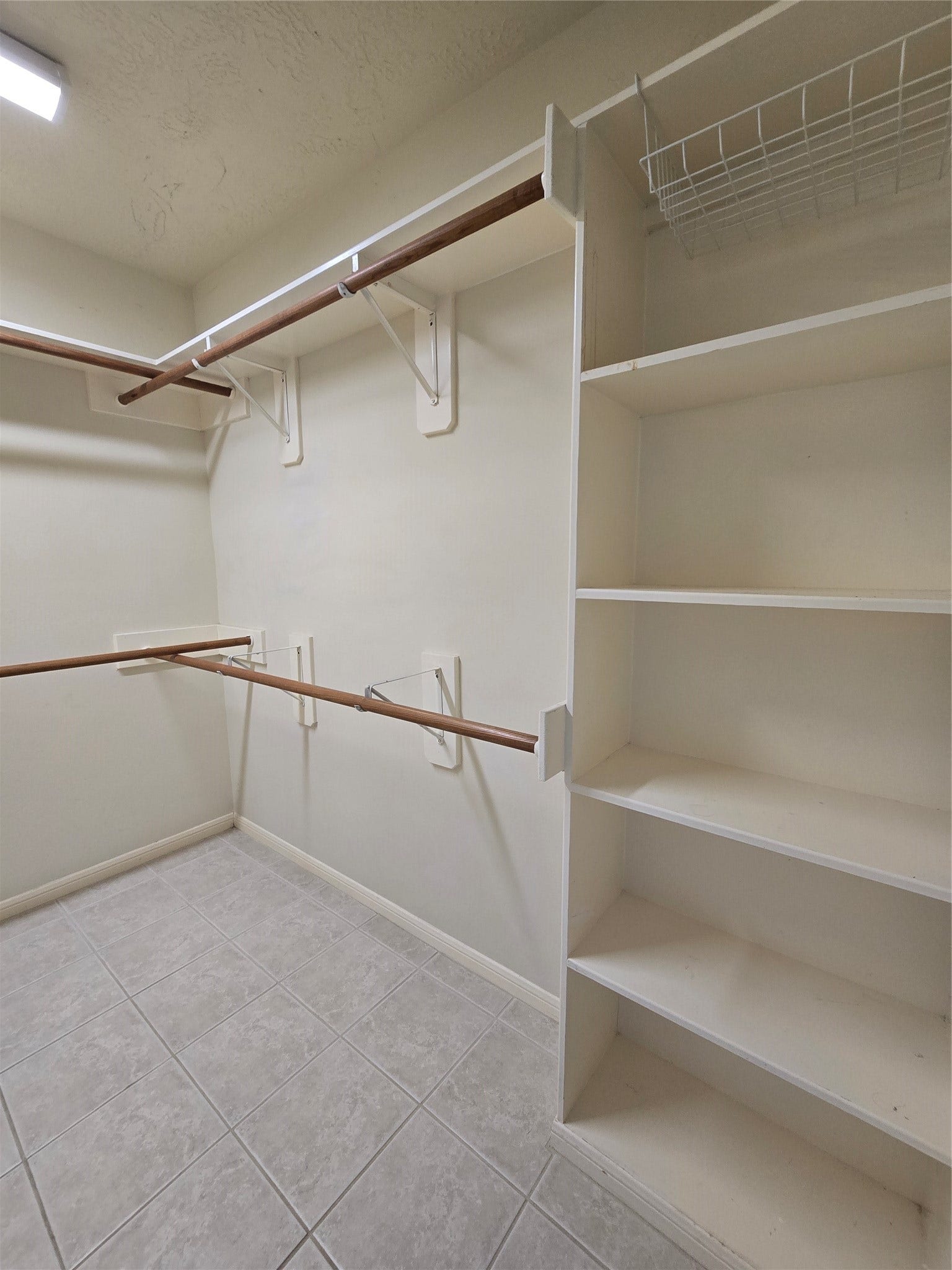Primary closet with built-in shelving