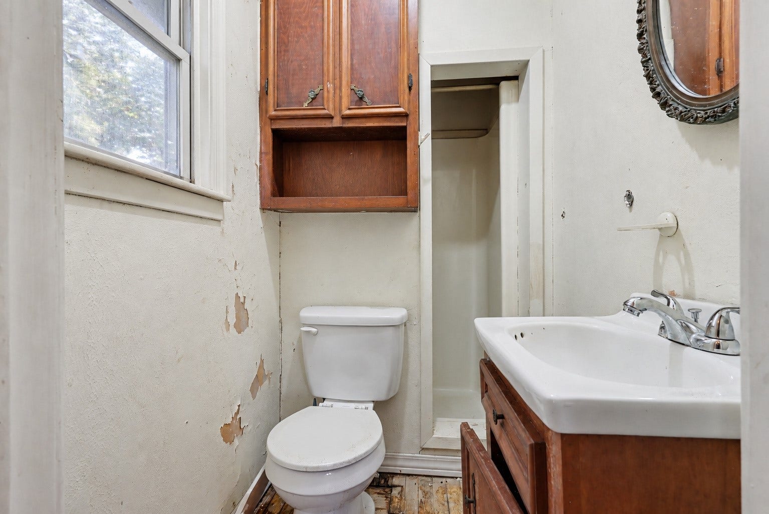 11 Craig Street, Baytown, TX 77521 Bathroom attached to Bedroom 1 with shower and vanity-Digitally edited to remove curtains and personal items