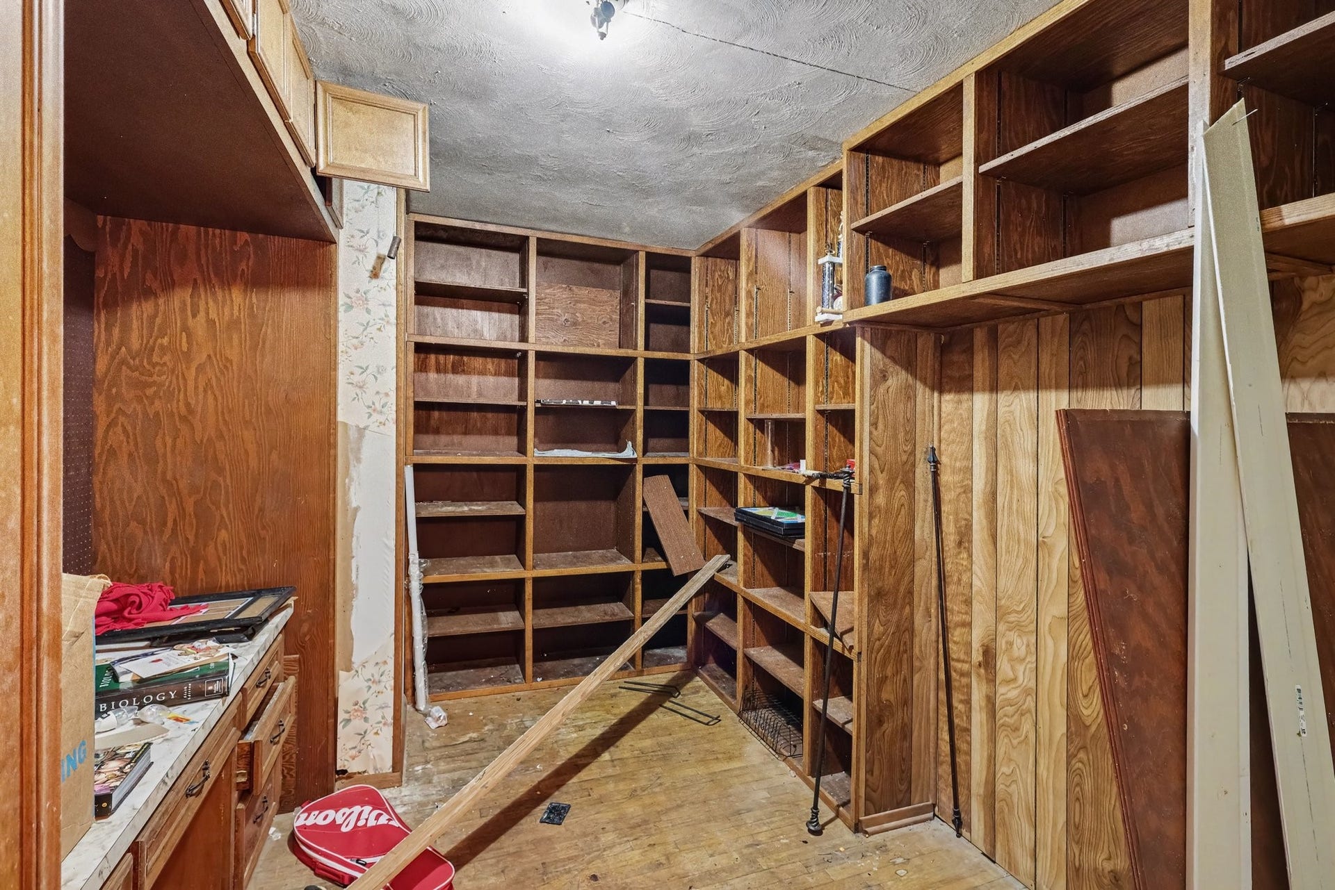 11 Craig Street, Baytown, TX 77521 Home office with extensive built-in shelving and wood paneling