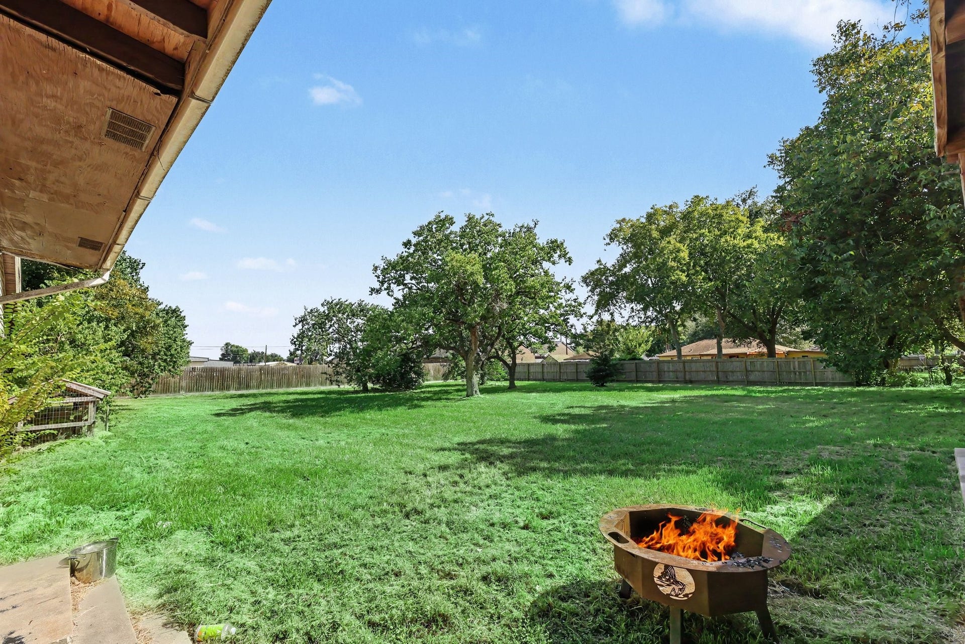 11 Craig Street, Baytown, TX 77521 Spacious Backyard with mature trees and plenty of room for outdoor gatherings